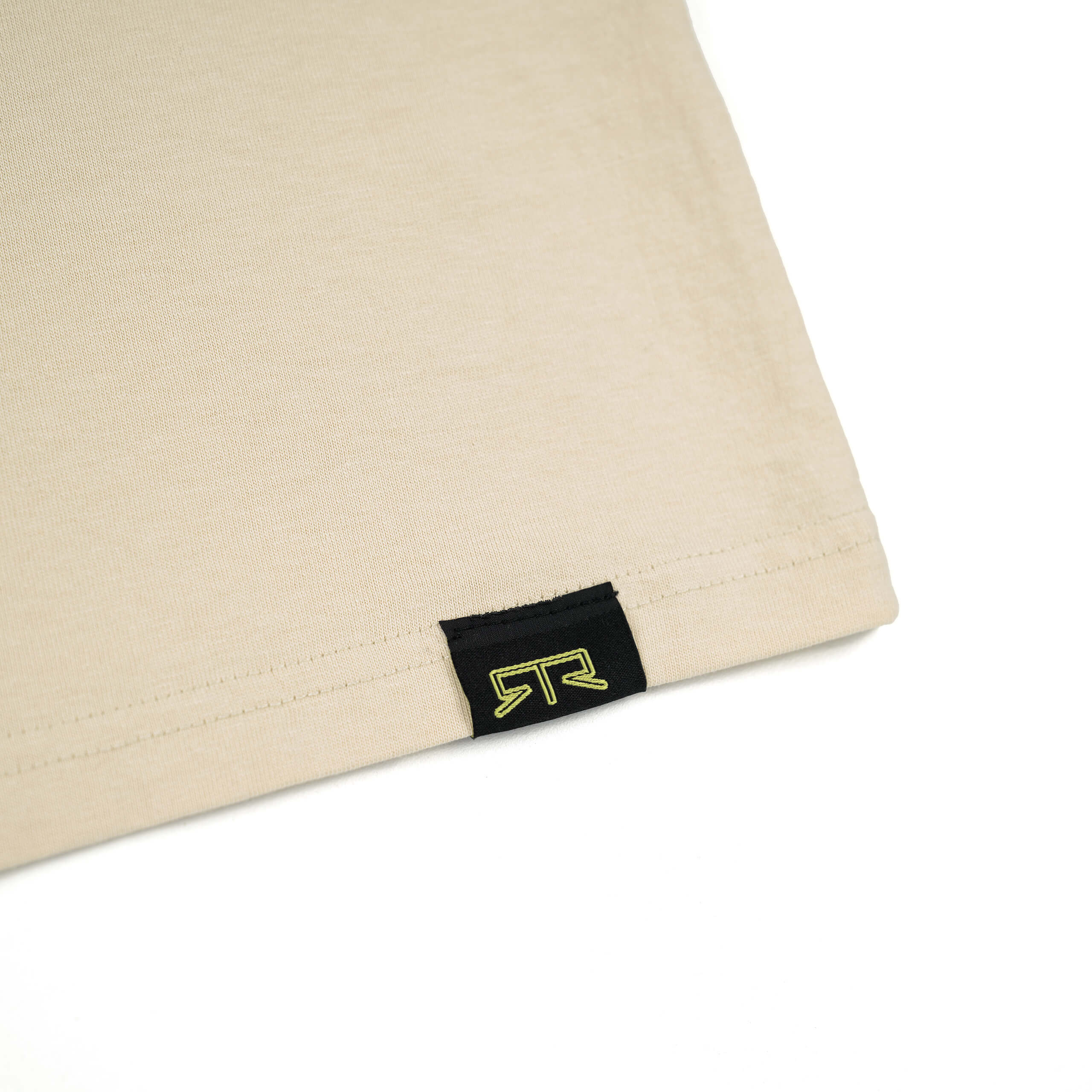 Close-up of RTR Equipp'd T-Shirt featuring a black and yellow logo, highlighting its design for Mustang culture enthusiasts, made from soft, breathable ringspun cotton.