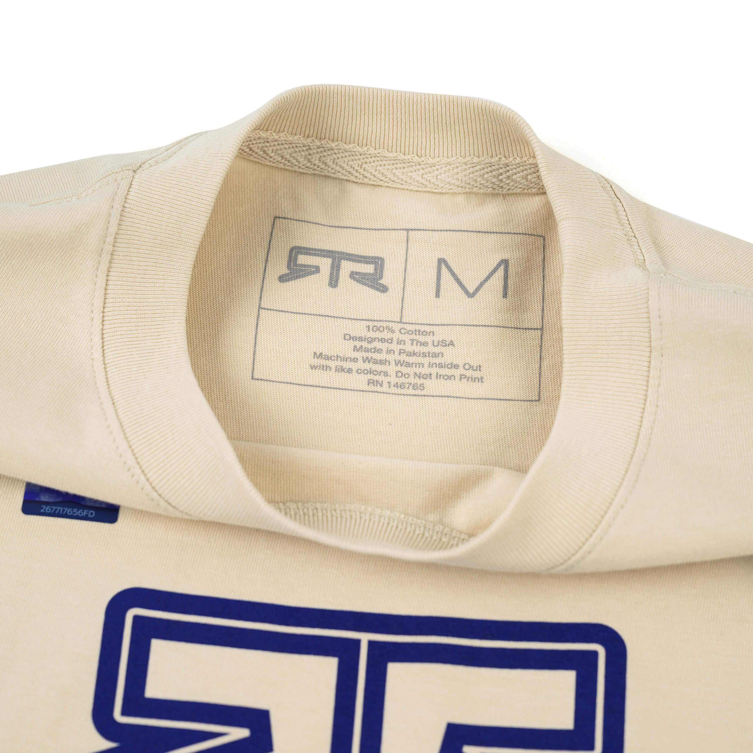 Close-up of the RTR Equipp'd T-Shirt, showcasing its breathable, ringspun cotton fabric and the distinct RTR hem tag, reflecting its Mustang culture connection.