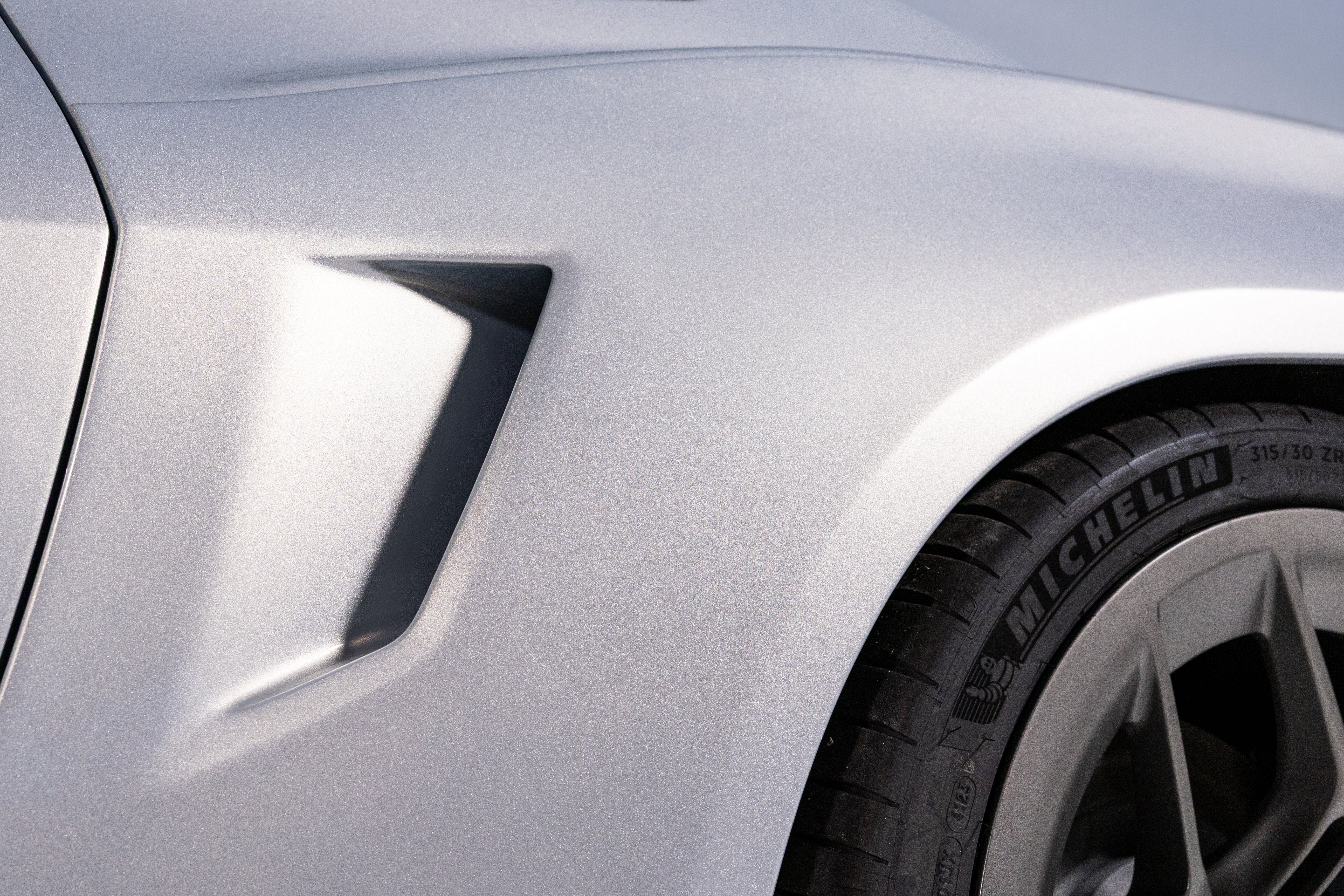 Detail shot of 2026 Mustang RTR Spec 5 rear quarter fender with tire cooling vents