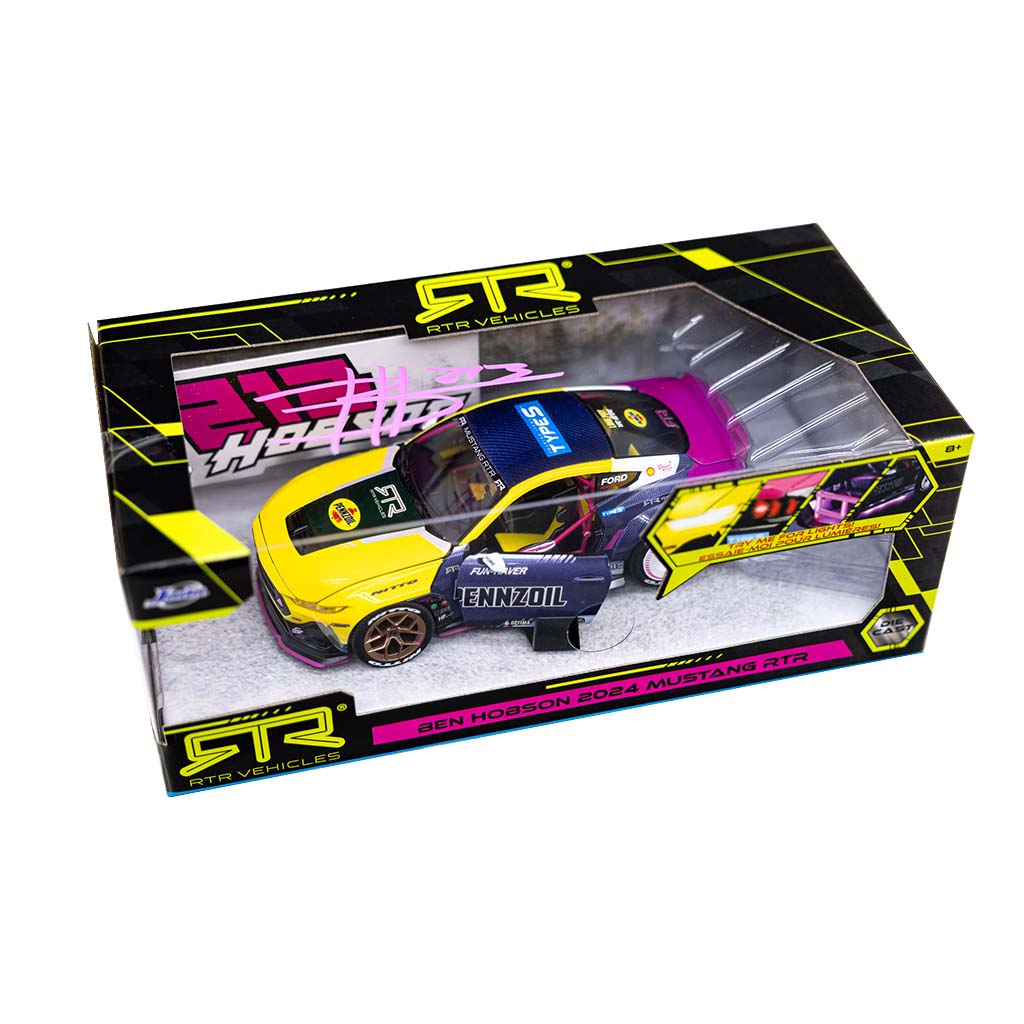 Autographed Ben Hobson's 2024 Ford Mustang RTR Spec 5-FD Diecast Model in box, showcasing detailed features and rubber tires of the collectible car.