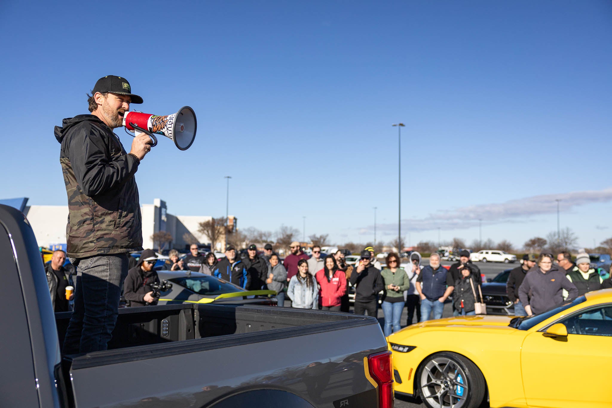Vaughn Gittin Jr. greets all the owners before the Mustang Cruise