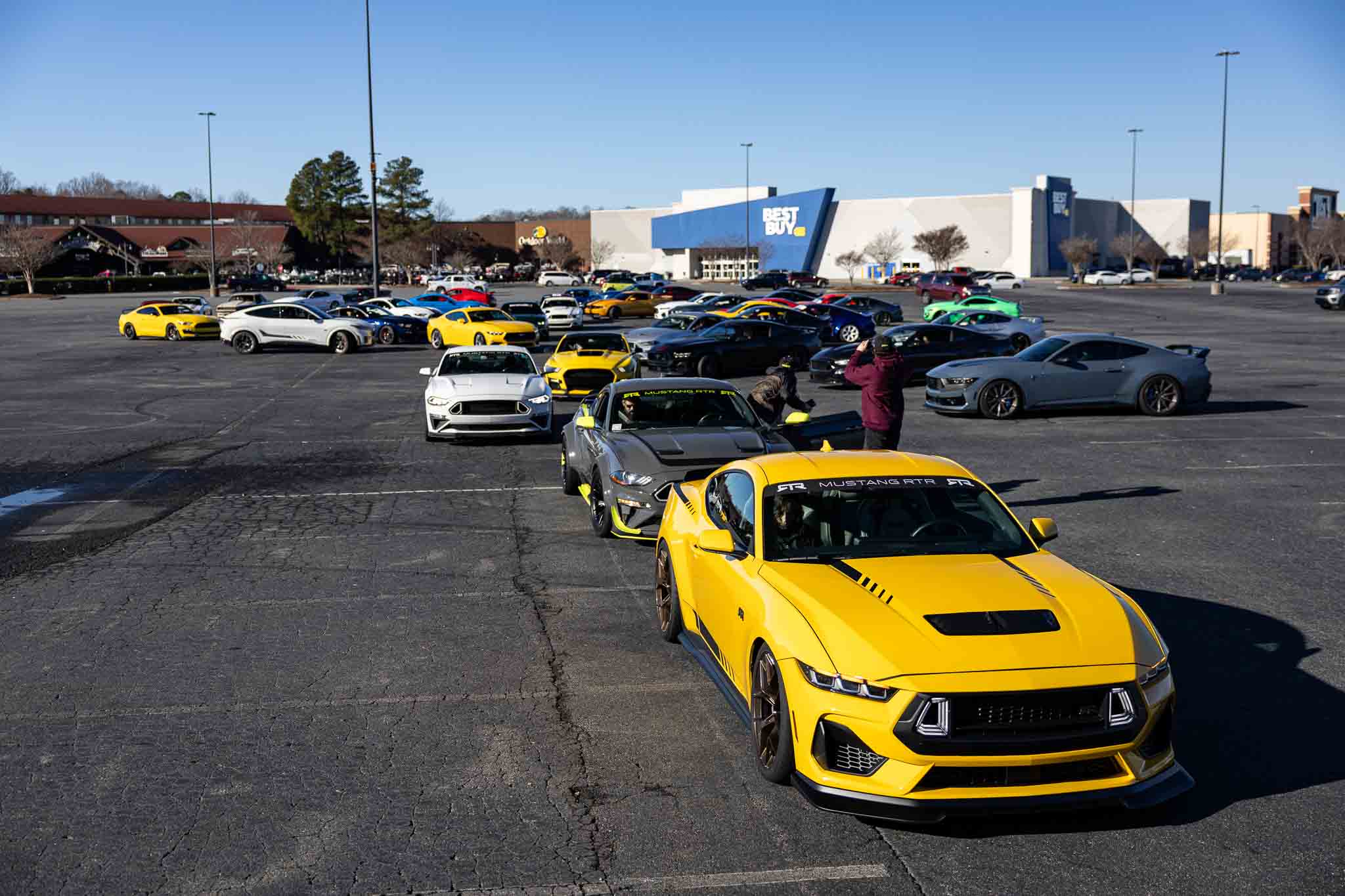 Mustang owners line up for the start of the cruise