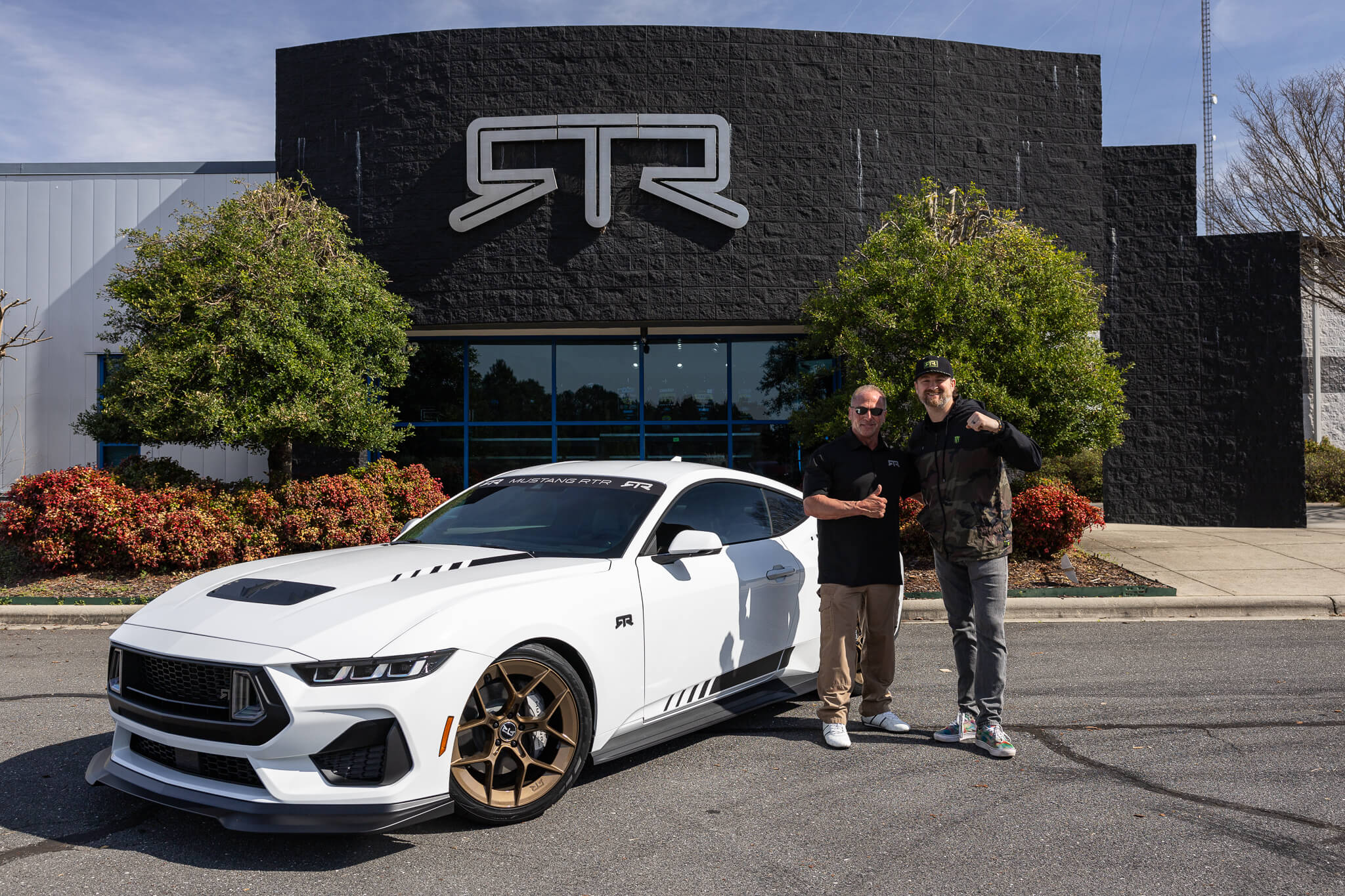 Vaughn takes a photo with a new RTR owner