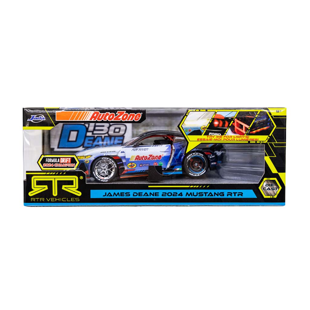James Deane's 2024 Ford Mustang RTR Spec 5-FD Diecast Model, showcasing detailed tires and interior in an open box, emphasizing its collectible racing design.
