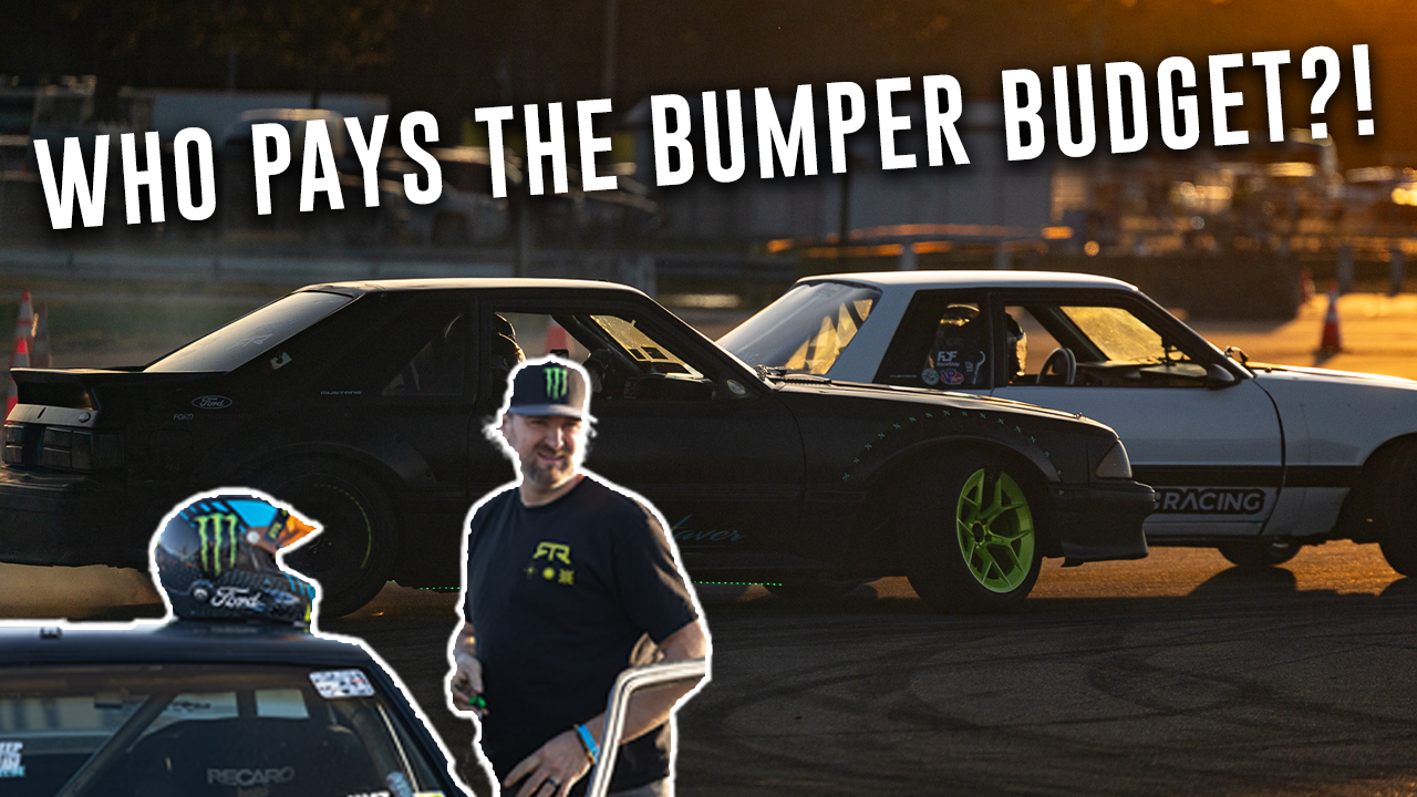 Vaughn Gittin Jr in front of 2 foxbody mustangs