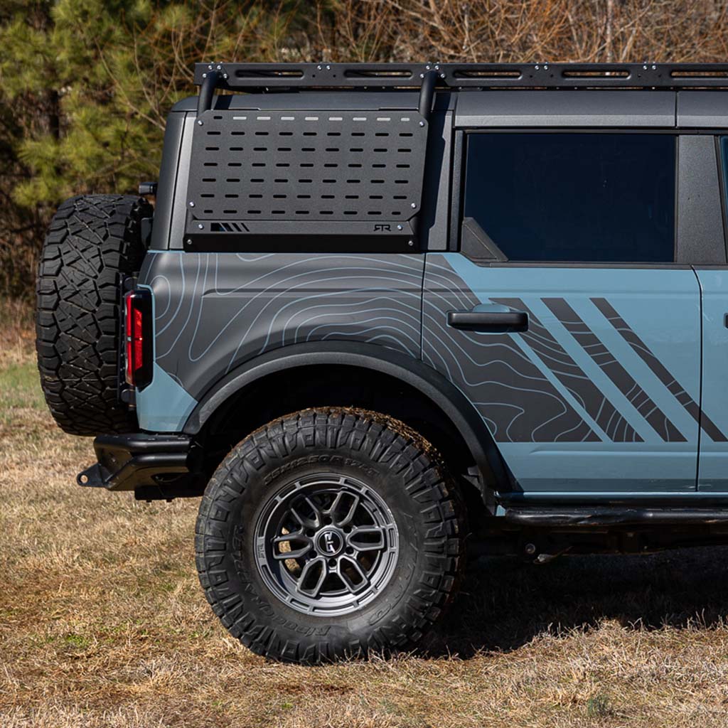 Bronco Roof Rack Molle Accessory Panel for Ford Broncos, featuring robust mounting points for off-road gear, crafted from heavy-duty aluminum with a black textured powder coat finish.