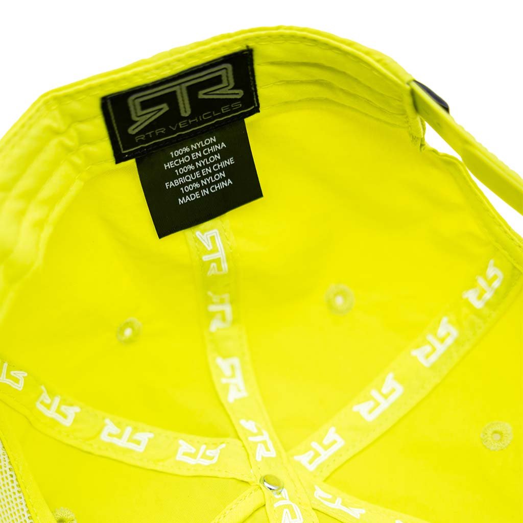 Interior view of Ford Mustang x RTR Collection 5 Panel Unstructured Snapback Hat, showing RTR Vehicles label and care tag, highlighting its nylon construction.