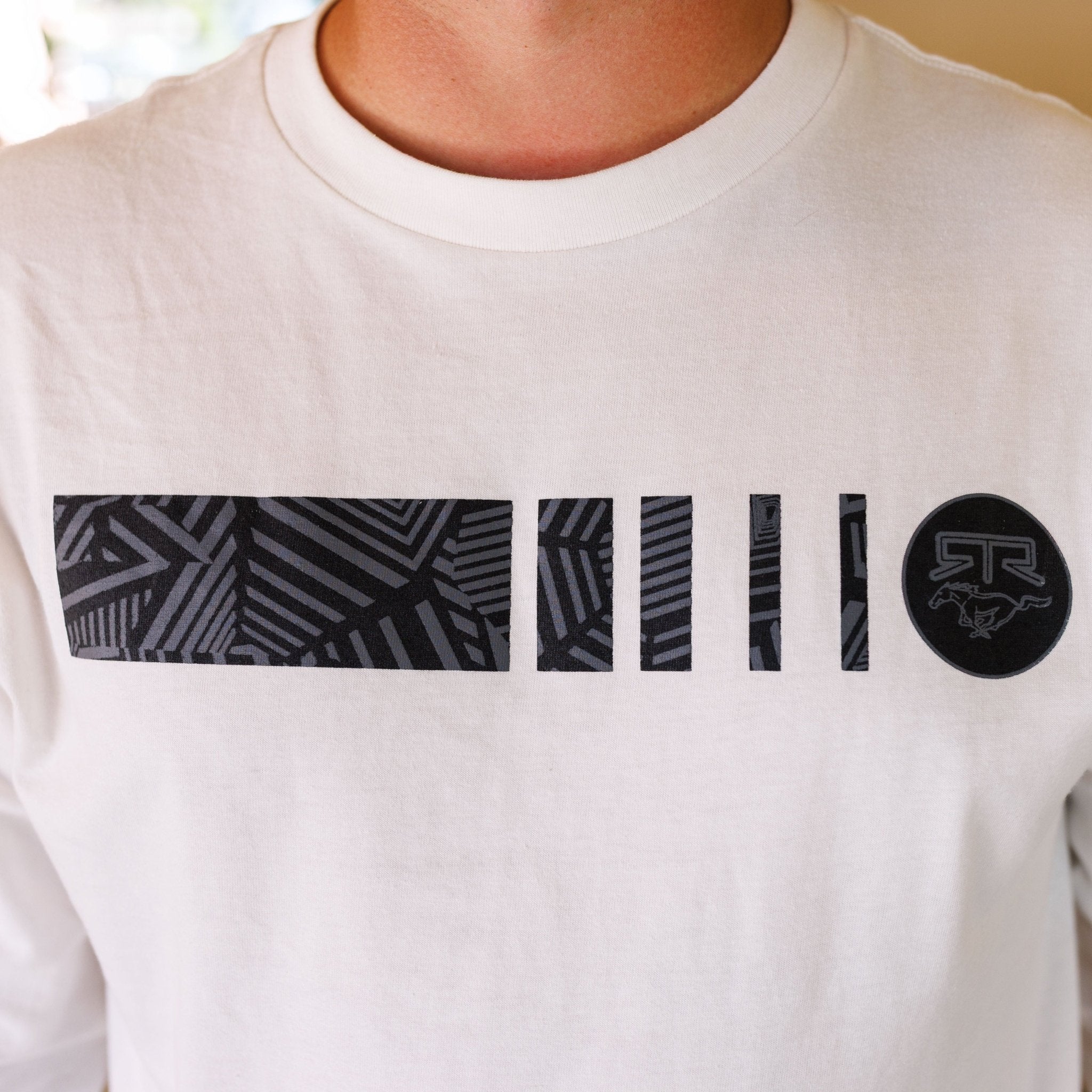 Ford Mustang x RTR Collection Frames Long Sleeve T-Shirt with a black graphic of geometric stripes and RTR logo, celebrating Mustang and RTR design fusion.
