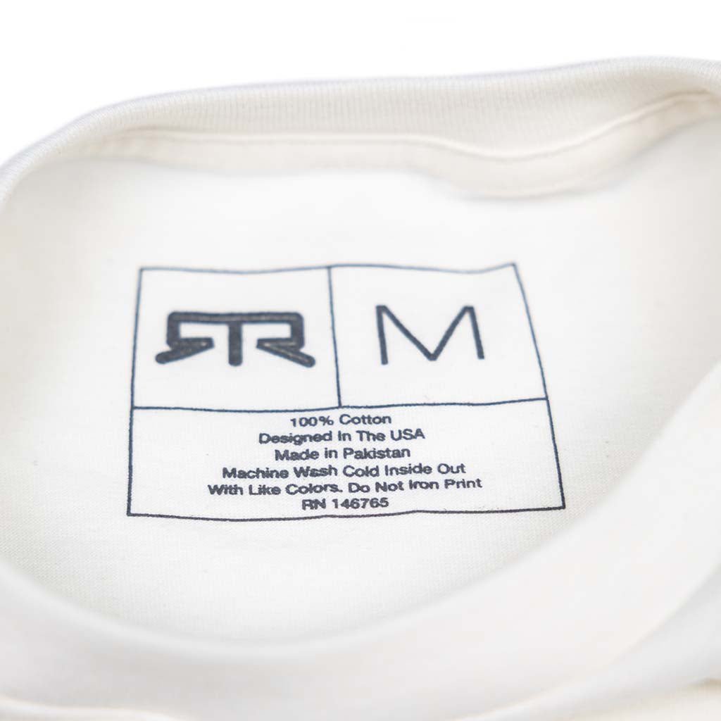 Inside back neck label of Ford Mustang x RTR Frames Long Sleeve T-Shirt, showing logo, size M, and care instructions, highlighting collaboration between Ford Mustang and RTR Vehicles.