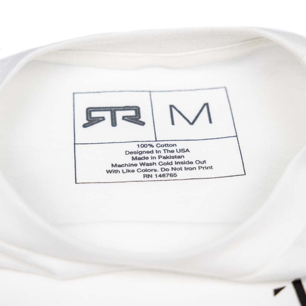 Close-up of the Ford Mustang x RTR Collection Pony T-Shirt label, showing size M, 100% cotton, care instructions, and origin details.