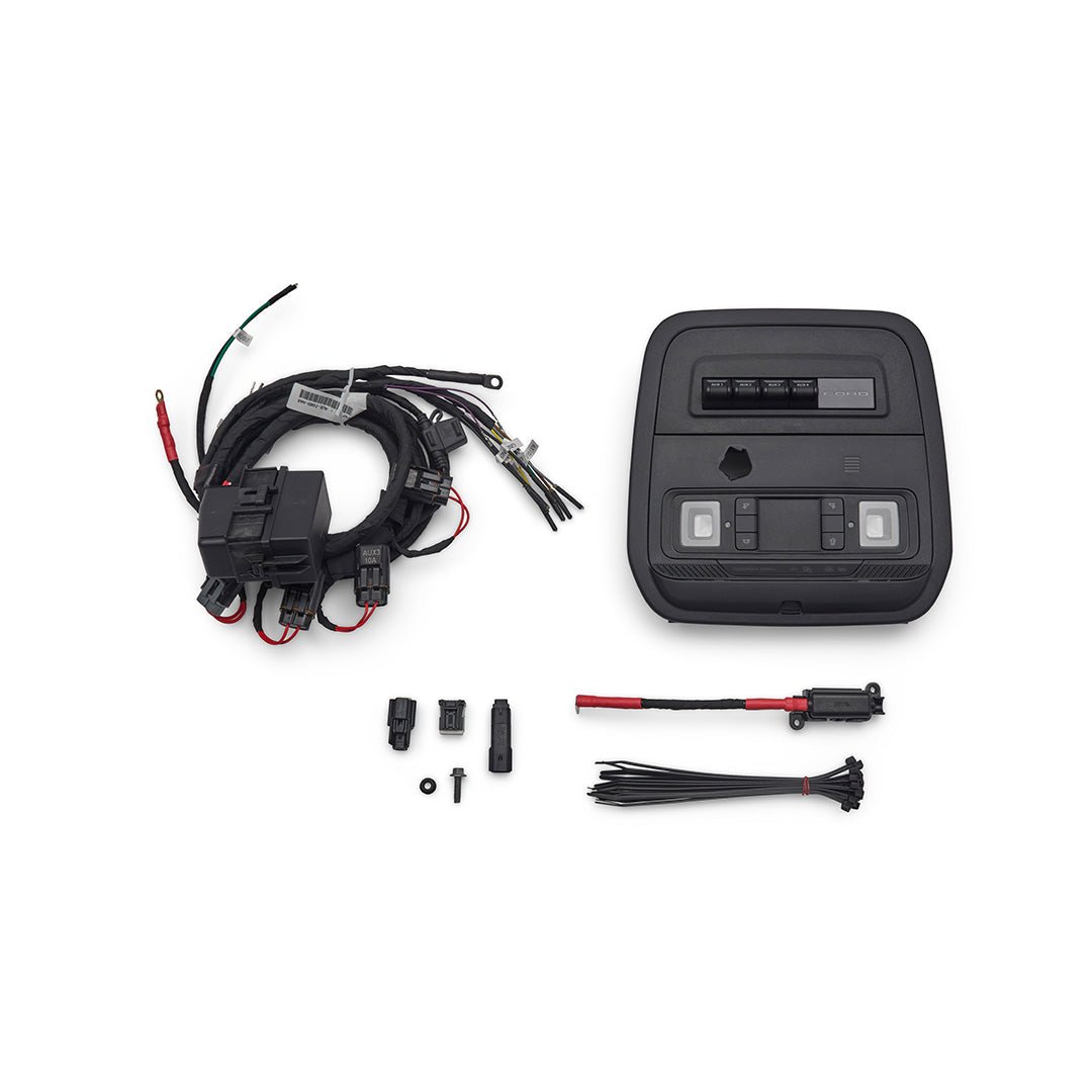 Ford Performance Auxiliary Switch Kit for 2021+ Bronco, featuring a wiring harness, console module with map lights and switches, inline fuse, connectors, and zip-ties for seamless installation.
