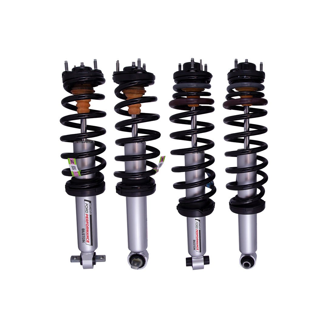 Ford Performance Off-Road Suspension 2 Lift Kit (21+ Bronco) featuring four silver coil-over struts with black springs, designed for enhanced ride and handling.