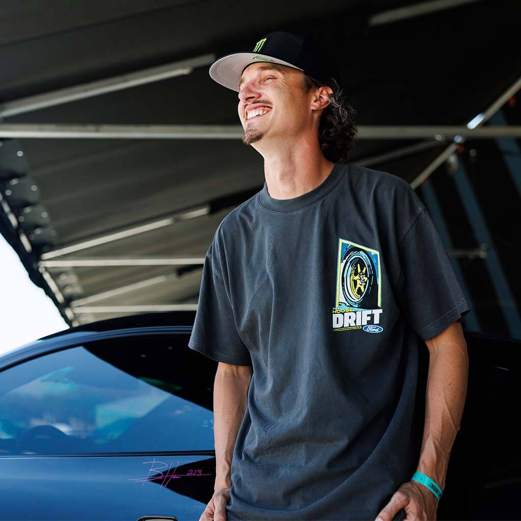 House of Drift T-Shirt featuring Vaughn Gittin Jr.’s Mustang RTR, showcasing a bold graphic tribute to Irwindale Speedway on the back, small logo on front.