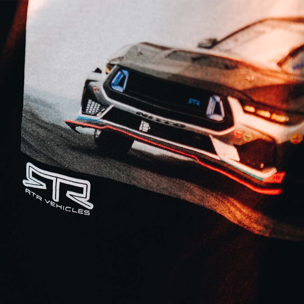 Close-up of Never Quit Tee  featuring James Deane's car on track, with handwritten Never Quit message and signature. Perfect for Formula Drift and RTR Drift Team fans.