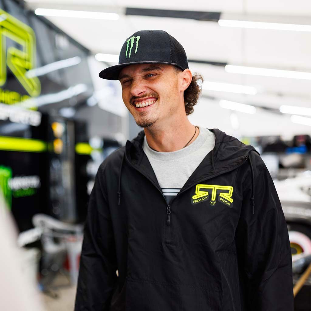 Ben Hobson wearing the black RTR Core Anorak windbreaker in the RTR pits at Formula Drift.