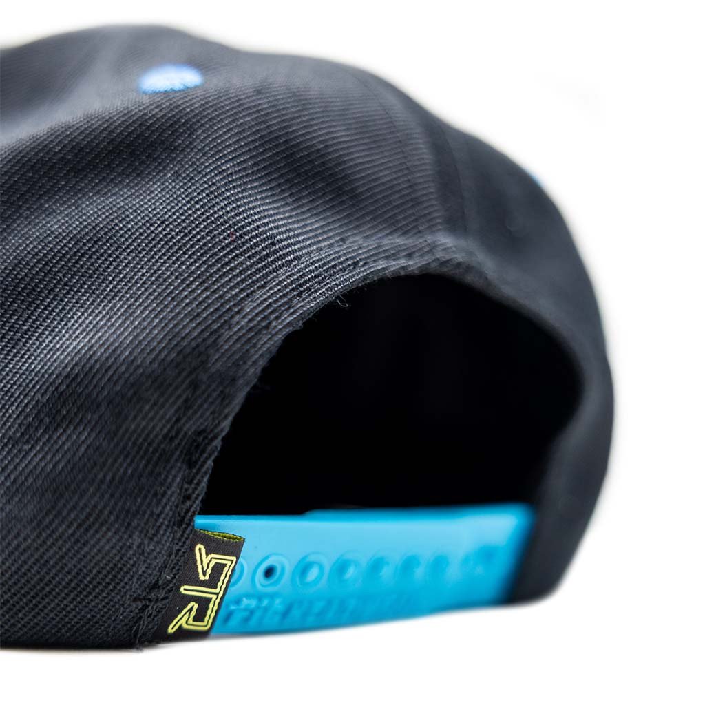 RTR Drift Team Snapback featuring a flat brim, structured crown, embroidered logo, and blue band, designed to celebrate RTR drivers with motorsport-inspired details.