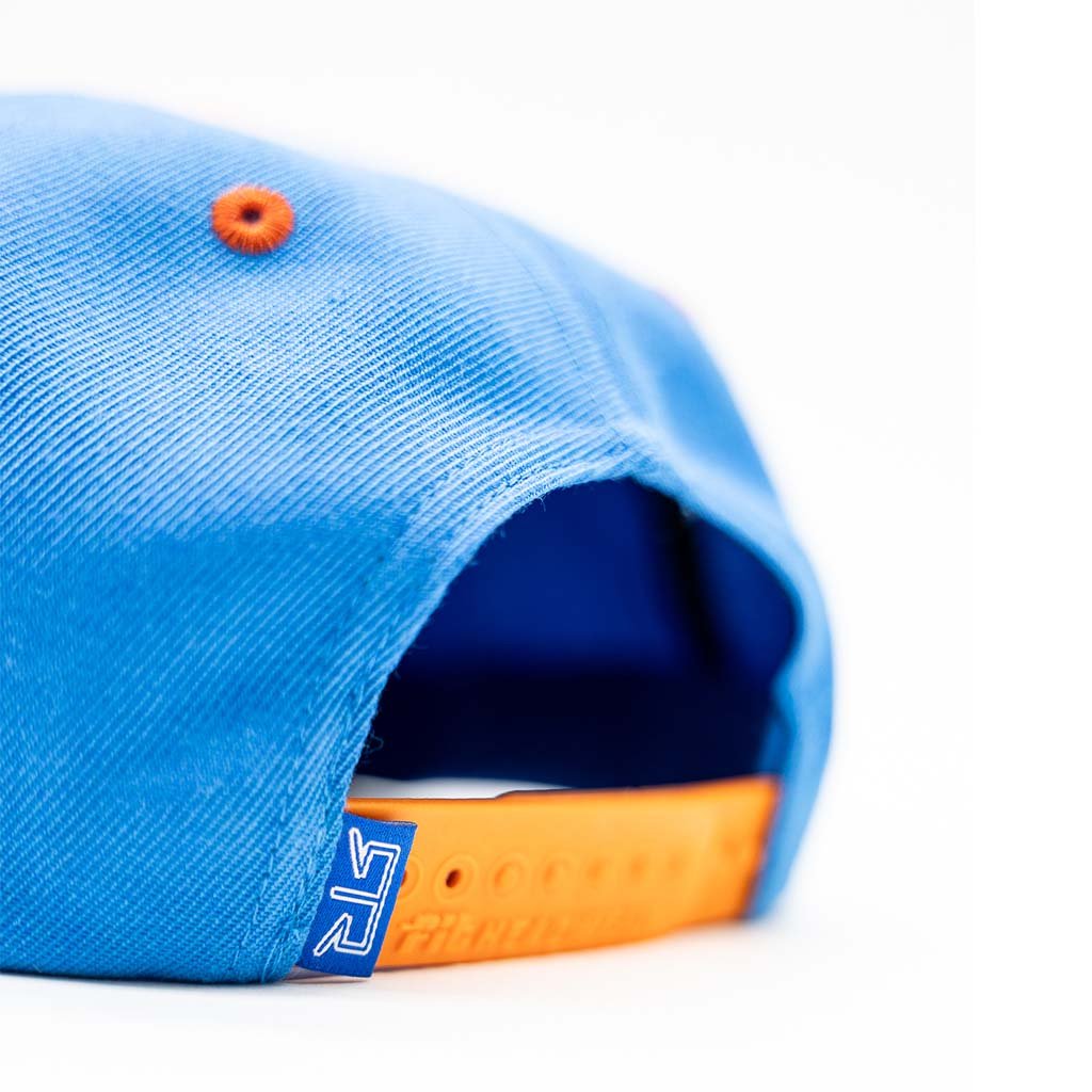 RTR Drift Team Snapback with orange trim and button, featuring embroidered logo, structured crown, flat brim, and custom taping, designed for motorsports fans.