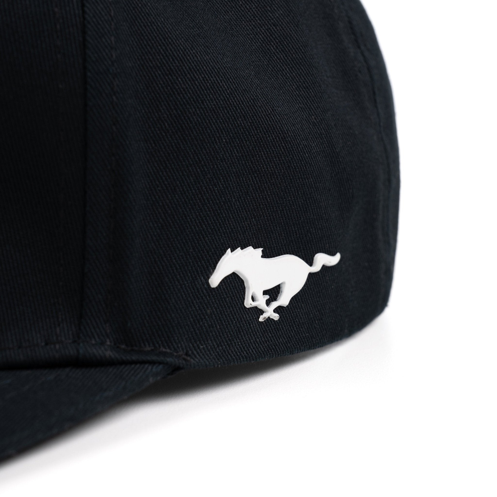 Black cap with a rubberized Ford Mustang logo on a white background