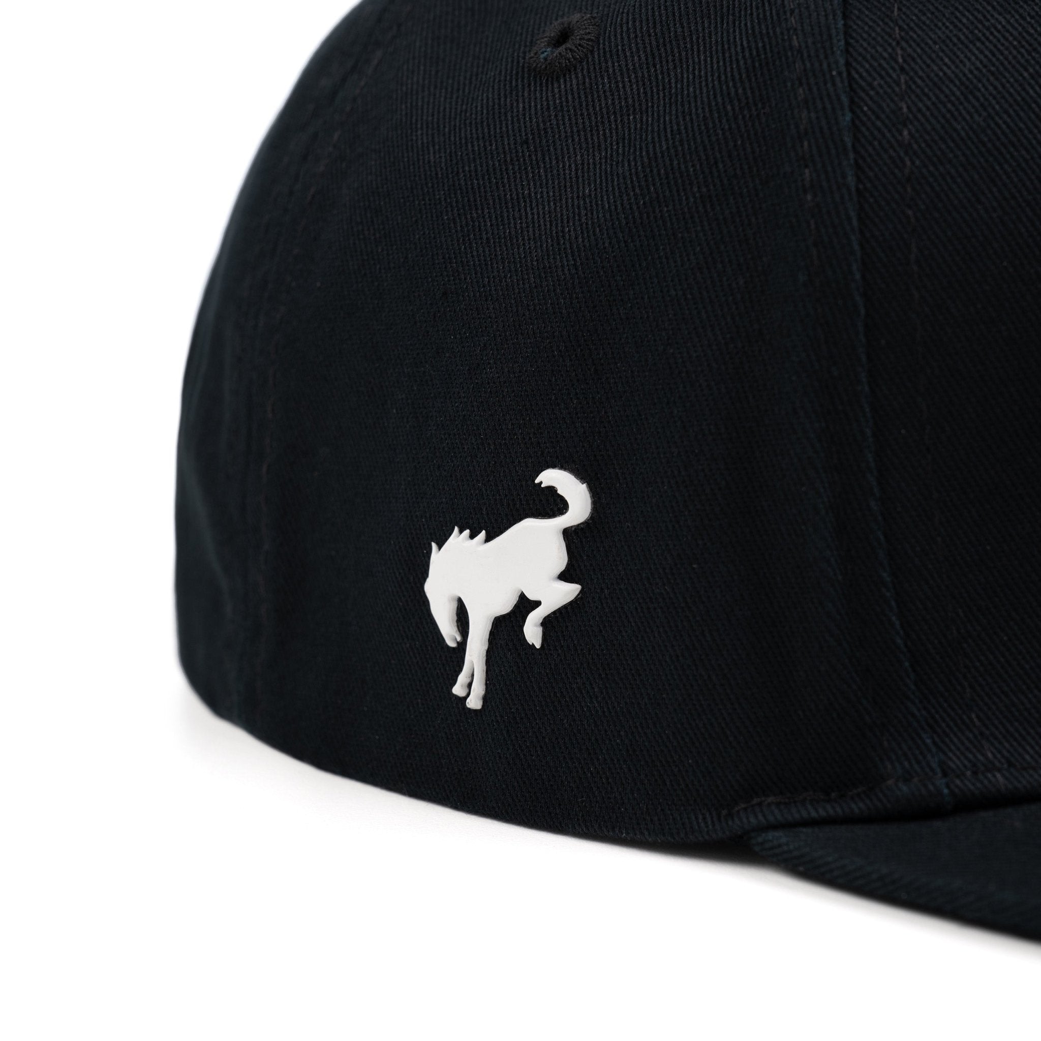 Black cap with a white rubberized Ford Bronco logo on a white background
