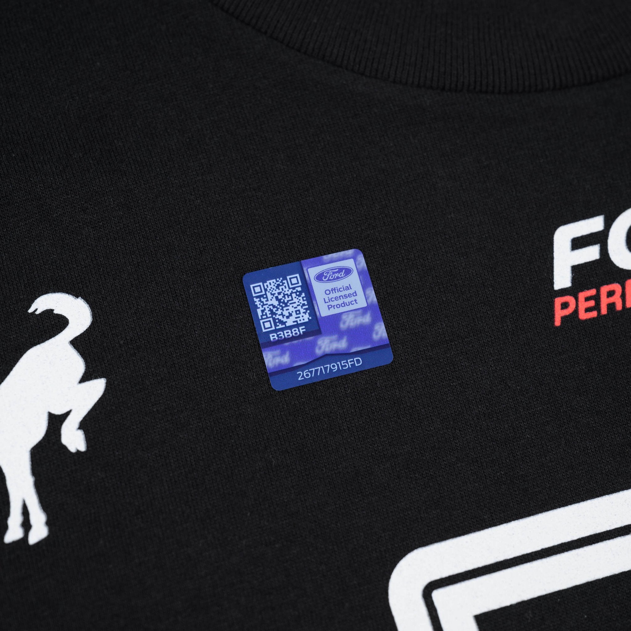 RTR Motorsports T-Shirt featuring a white frog silhouette logo and QR code, reflecting RTR's racing spirit on a black fabric, 100% ringspun cotton.