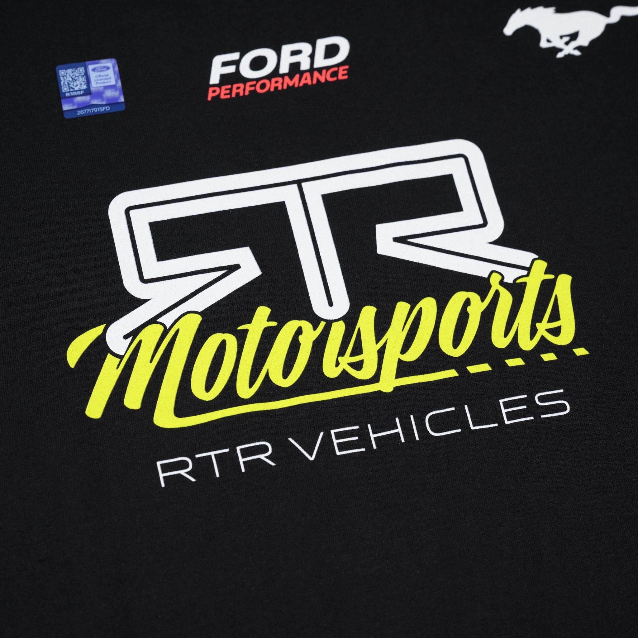 Close-up of RTR Motorsports T-Shirt featuring bold graphics and a logo, inspired by Mustang and Bronco racing, crafted for performance and comfort.