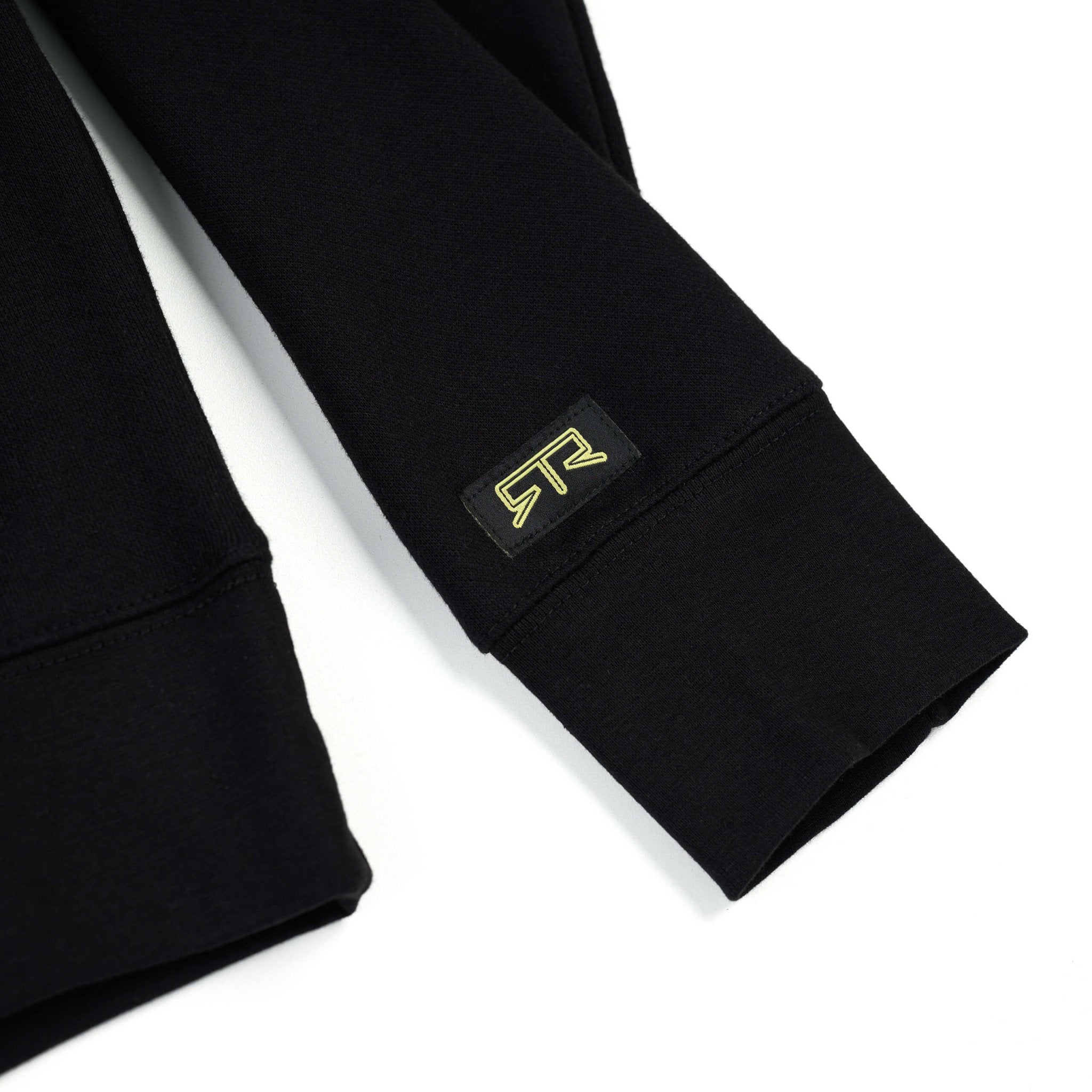 RTR Parts & Accessories Crewneck Sweatshirt with a black sleeve featuring a woven RTR label, showcasing bold Hyper Lime and white branding on durable fabric.