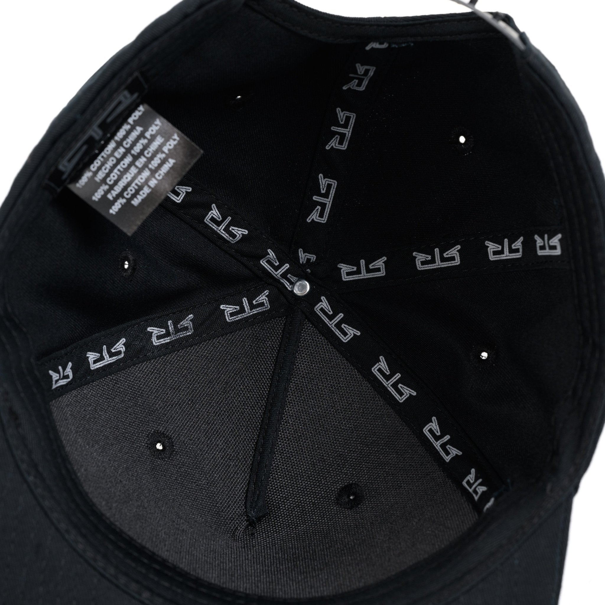 Black cap with RTR brand logo on the brim's inner lining against a white background