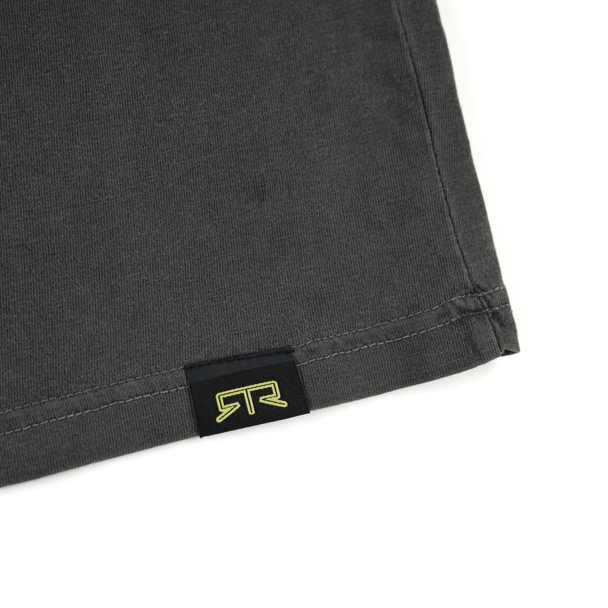 Close-up of the RTR Parts & Accessories T-Shirt, showcasing the logo and black fabric texture, emphasizing its garage-built attitude and authenticity.