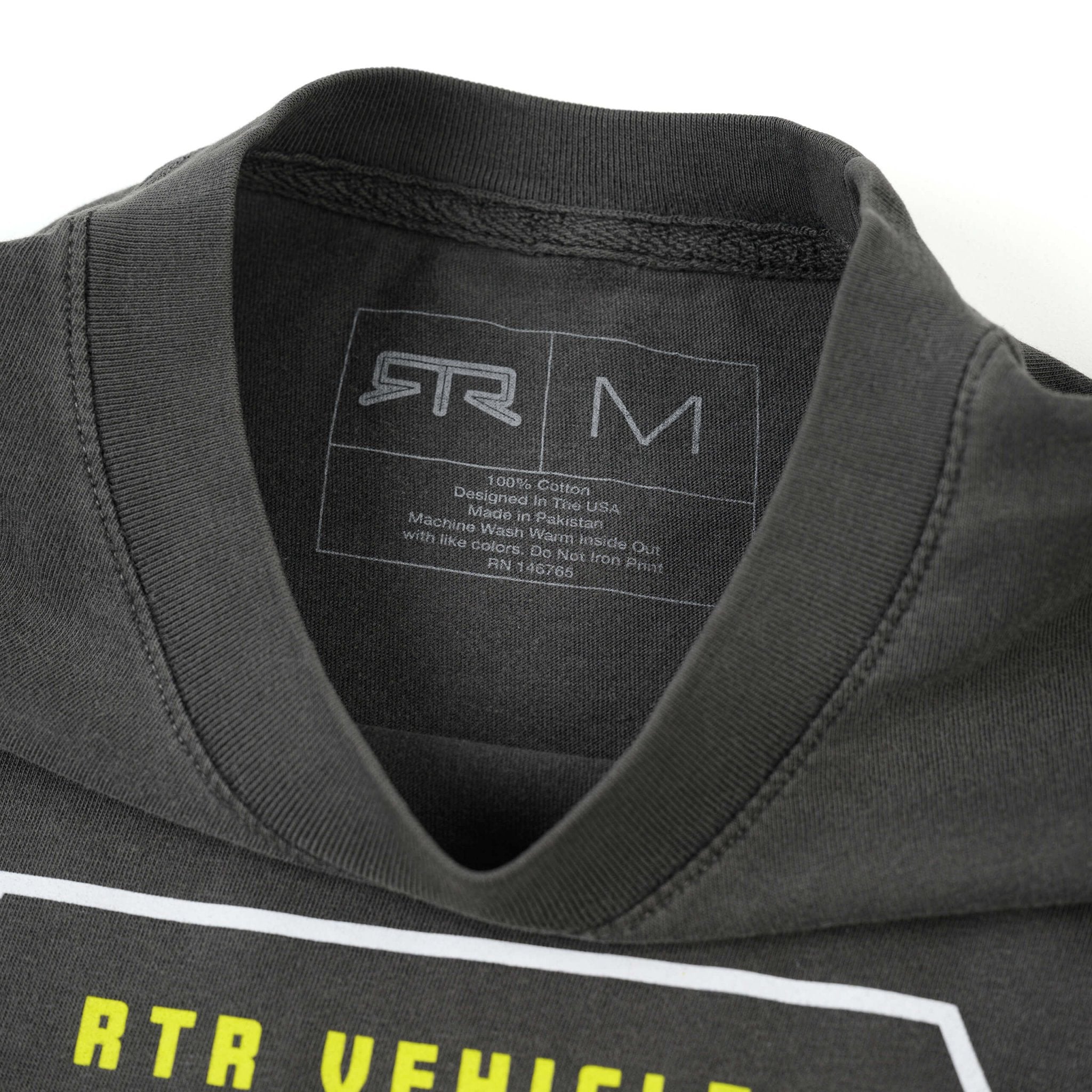 RTR Parts & Accessories T-Shirt, featuring bold yellow lettering and an RTR hem tag, crafted from soft, ringspun cotton with a river-washed finish for a lived-in look.