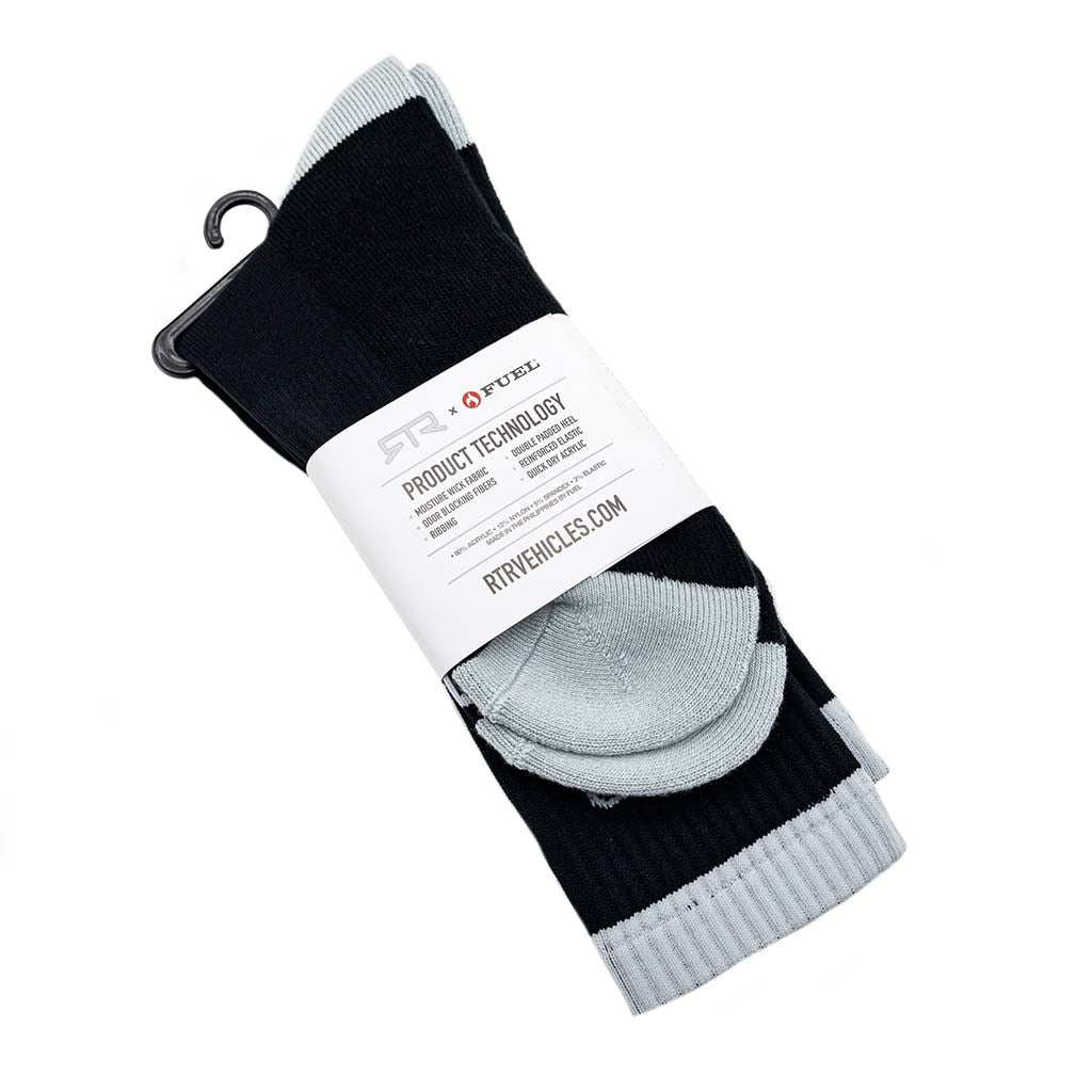 RTR Socks displayed on a hanger, highlighting their unique design with Clutch Kick and Loud Pedal text, ideal for style and comfort.