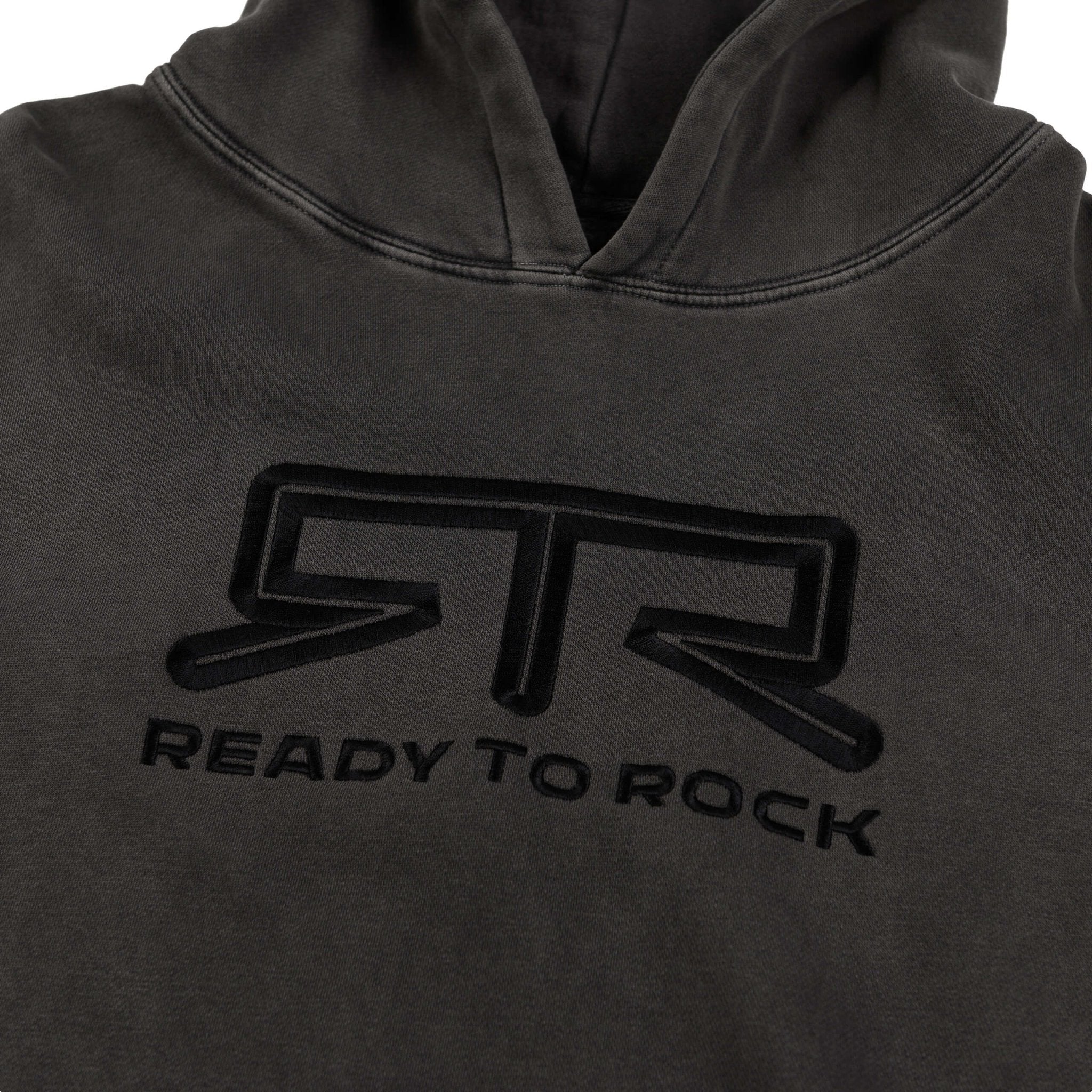 Close-up of the RTR Tonal Logo Hoodie with raised logo embroidery on heavyweight fleece, featuring a double-lined hood and no drawstrings