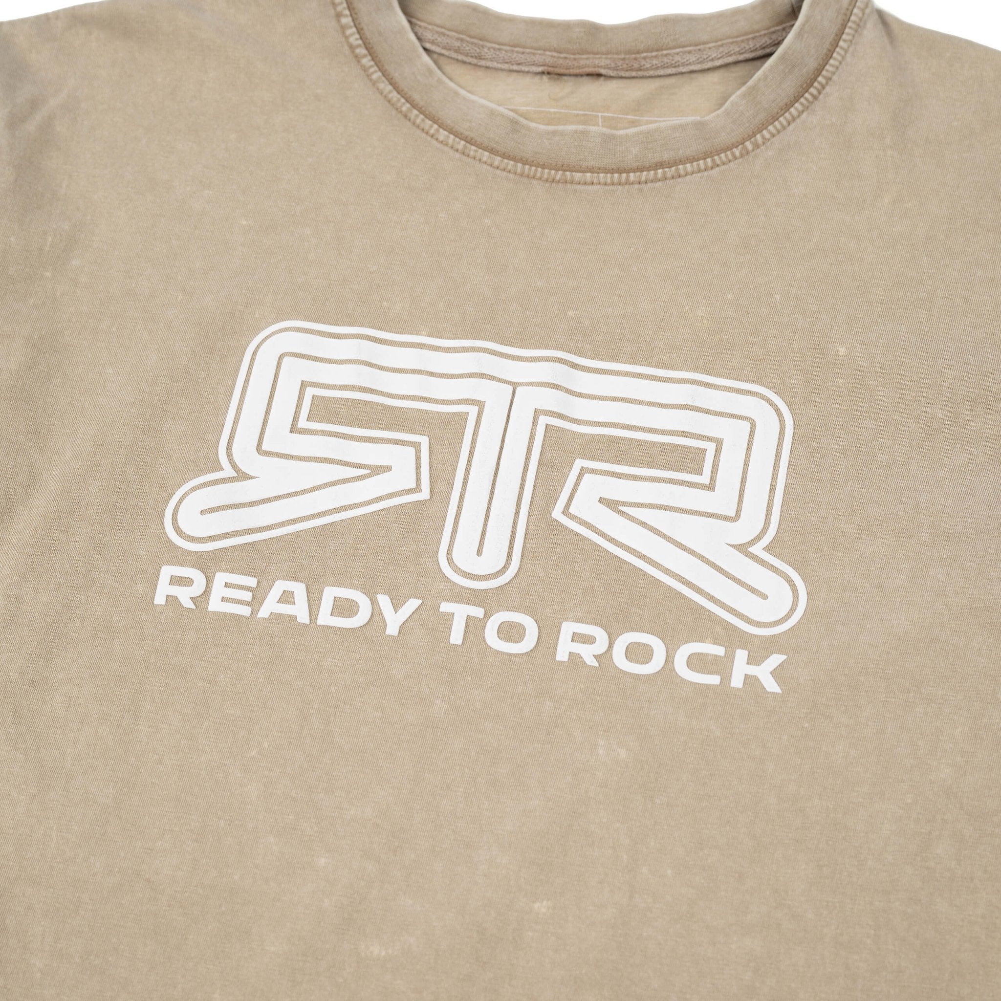 Close-up of the RTR® Tonal Logo T-Shirt, showcasing a subtle puff print logo with Ready to Rock™ text on a smooth fabric surface.
