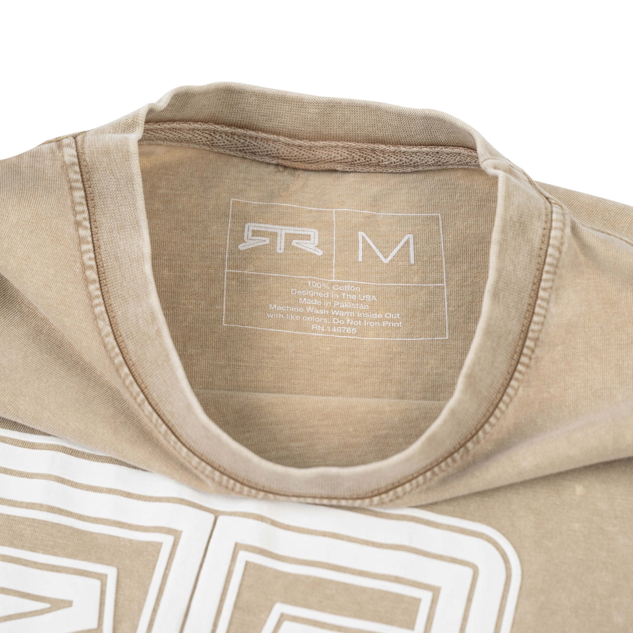 Close-up of the RTR Tonal Logo T-Shirt's fabric, showcasing the subtle tonal puff print logo and Ready to Rock™ text, emphasizing its comfortable, durable cotton texture.