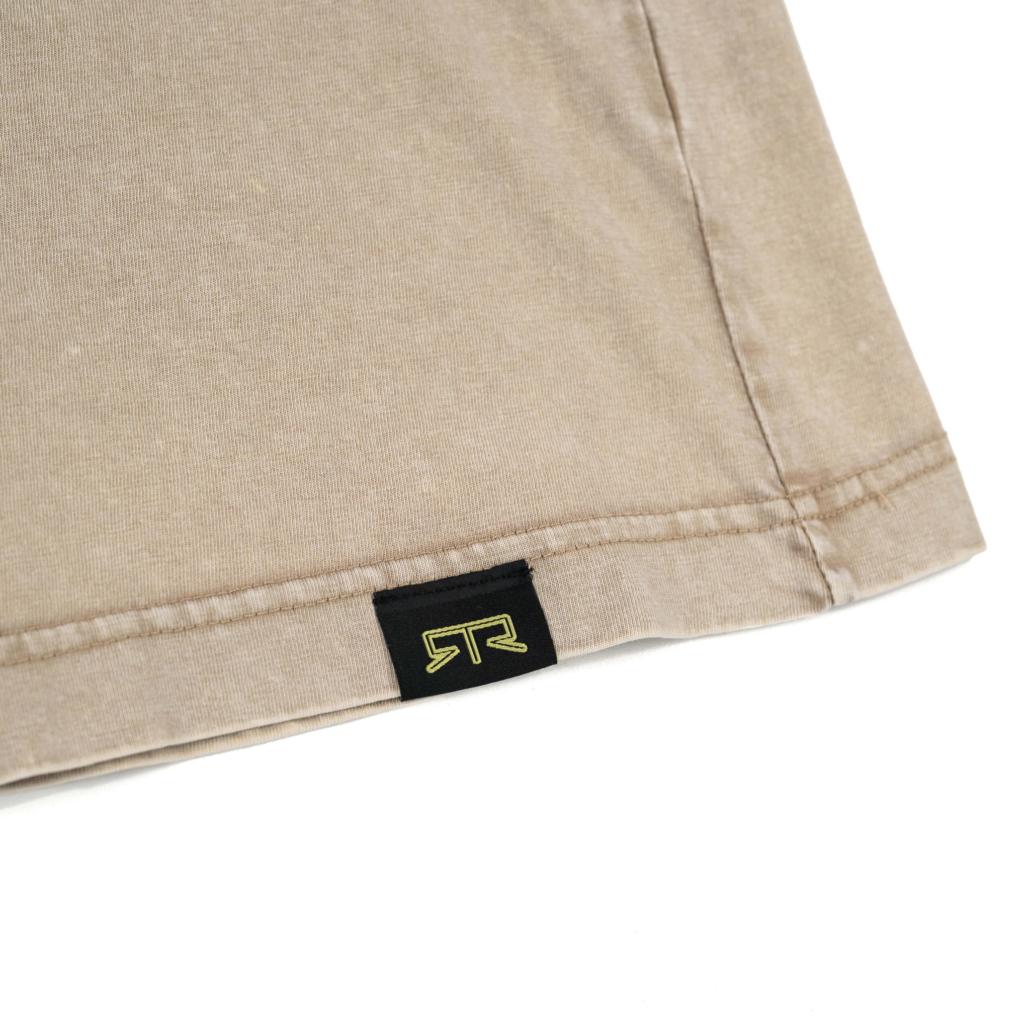 Close-up of RTR Tonal Logo T-Shirt fabric with puff print logo, showcasing the shirt's texture and quality, ideal for everyday wear.