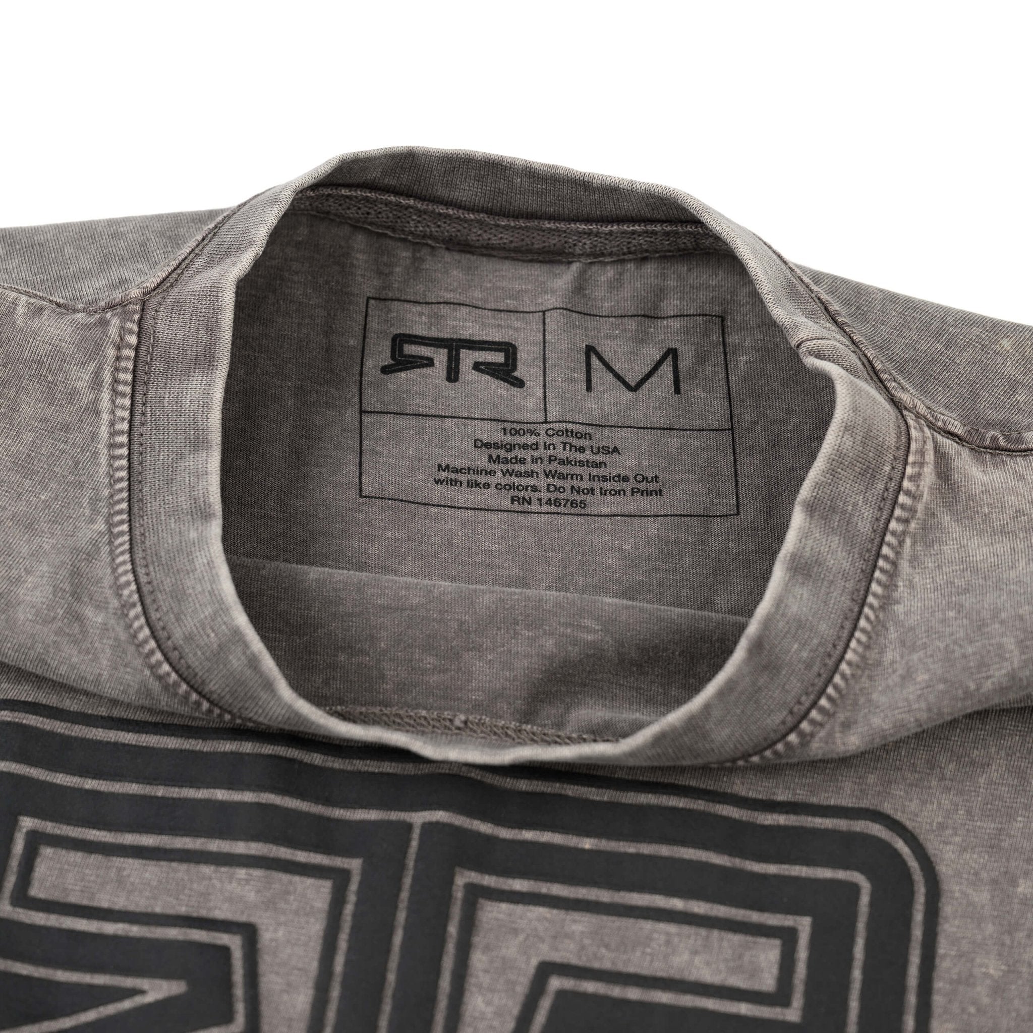 Close-up of the RTR Tonal Logo T-Shirt, highlighting the tonal puff print logo and “Ready to Rock™ beneath, showcasing its 100% cotton, tagless design.