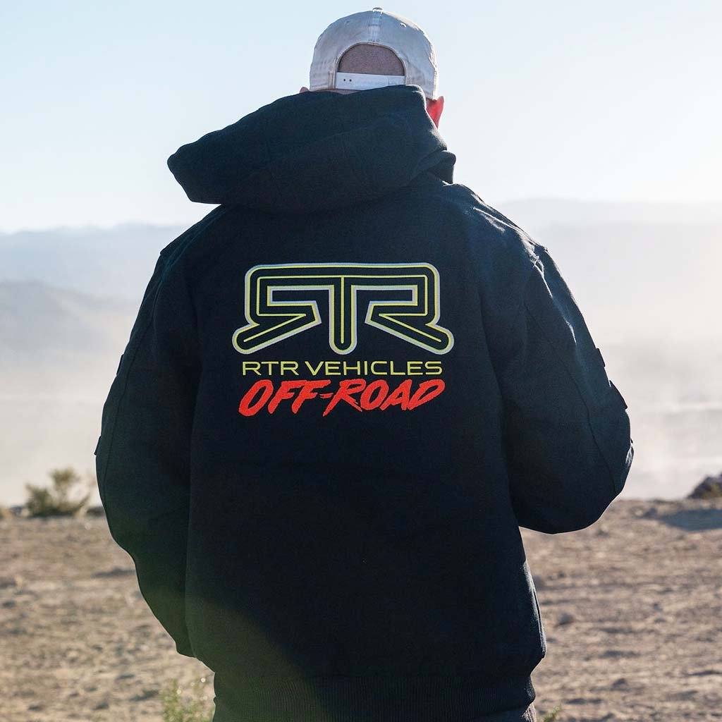 Back view of the RTR Vehicle Off-Road jacket out in the wild.