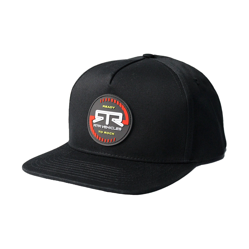 Front left view of the RTR Vehicles Rotate Black snapback hat with the RTR Rotate sewn on rubber logo patch.