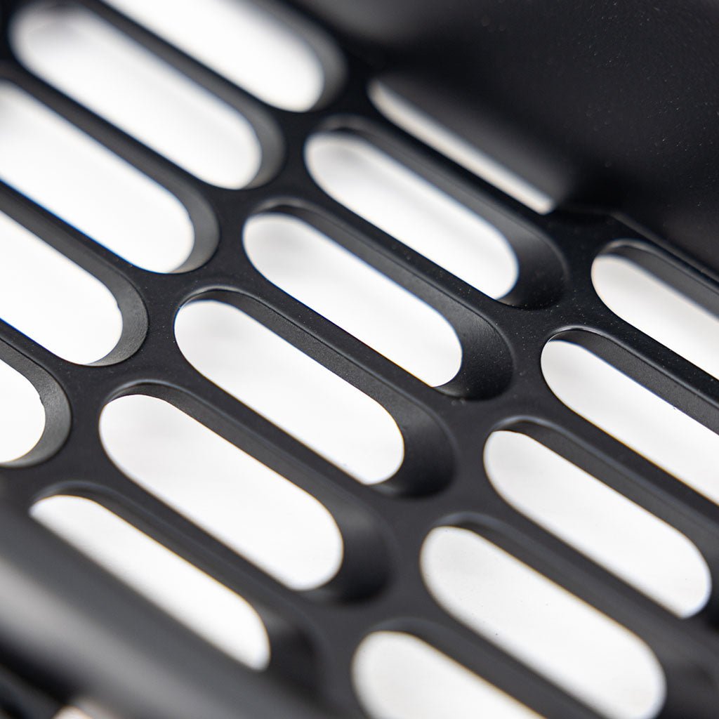 Close-up of RTR Corner Grilles for 24+ Mustang GT, showcasing signature Pill Pattern design and durable black ASA plastic construction. Easy, no-cut installation for a sleek, standout Ford Mustang upgrade.