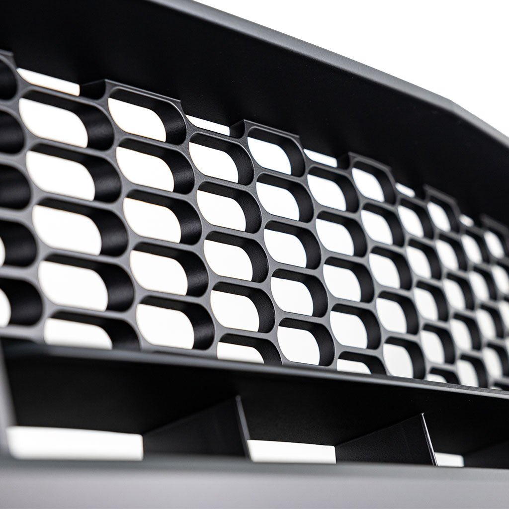 Close-up of RTR Upper Grille w/ LED Air Intakes for 24+ Mustang, featuring variable pill pattern, LED accent lights, and integrated switchback function for seamless airflow direction.
