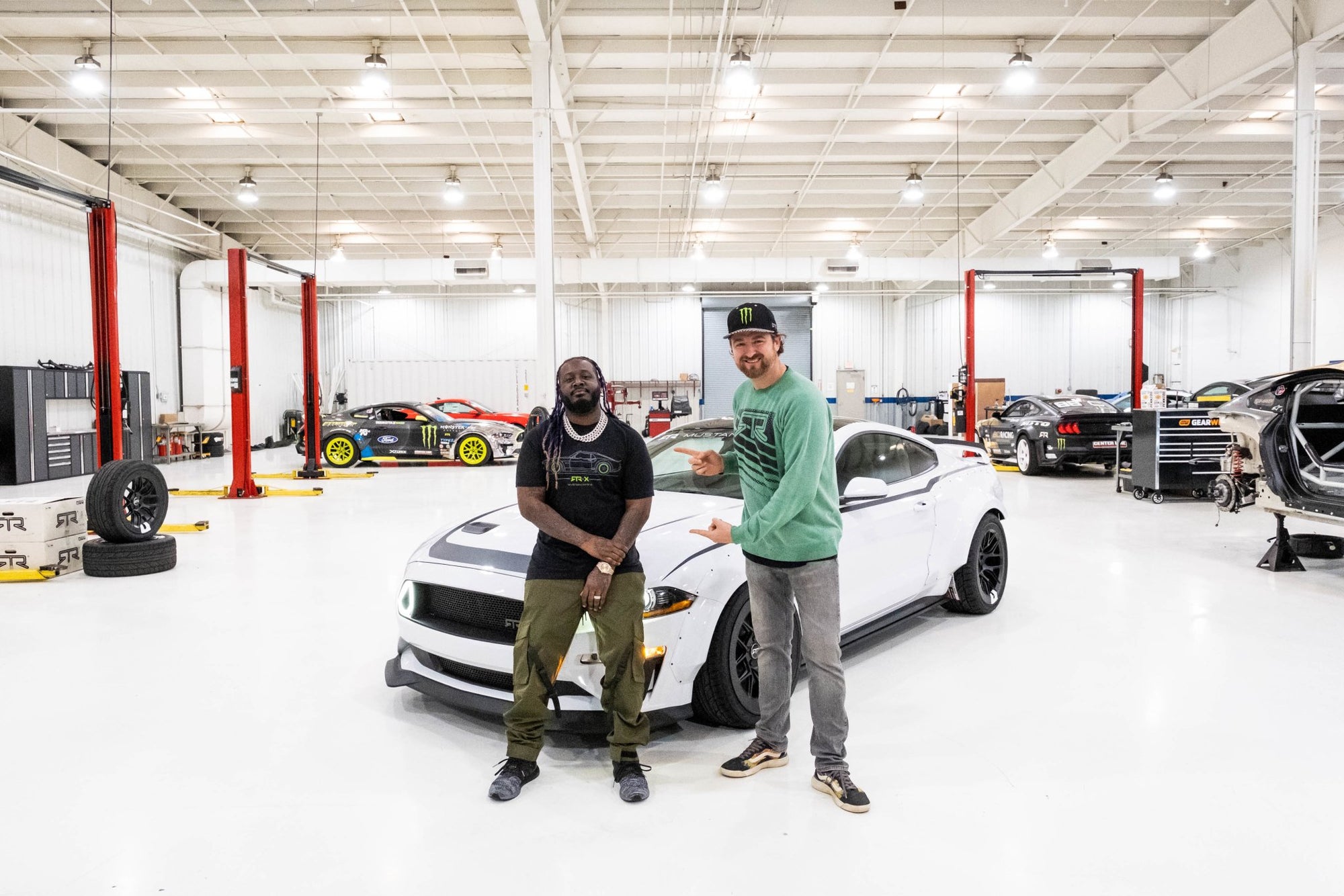 T-Pain and Vaughn Gittin Jr. in front of T-Pain's 2021 Mustang RTR Spec 2