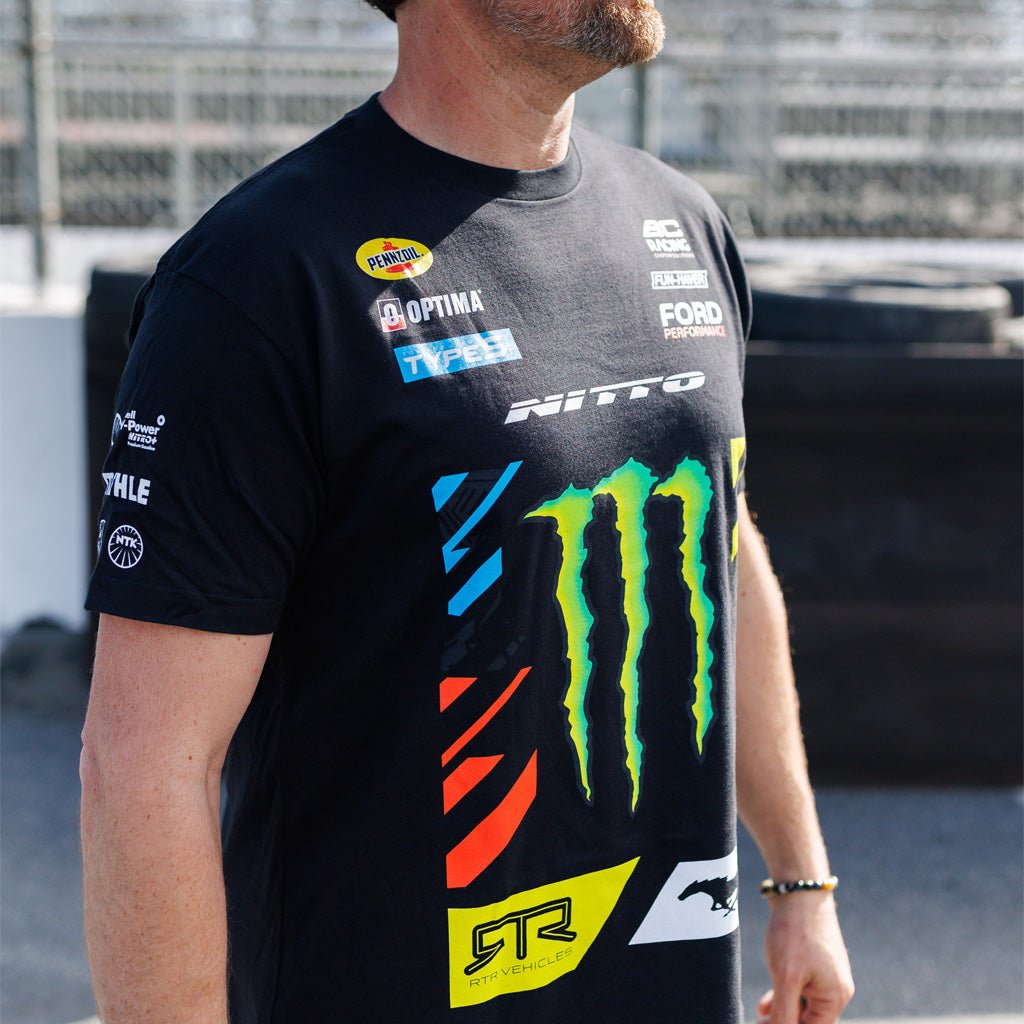 Man wearing the 2025 Vaughn Gittin Jr. RTR Vehicles Drift Team Shirt, the the front featuring the RTR Drift Team's partner logos