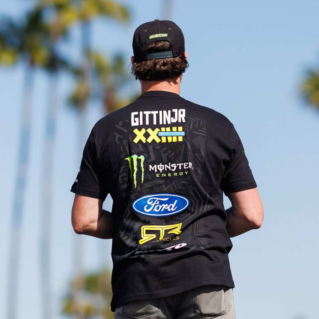 Vaughn Gittin Jr wearing 2025 Vaughn Gittin Jr. RTR Vehicles Drift Team Shirt with partner logos, featuring durable, soft ringspun cotton, perfect for drift enthusiasts.