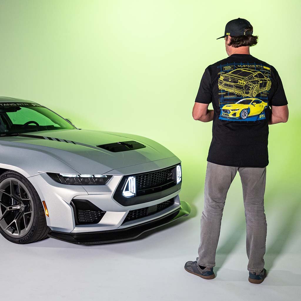 Man wearing a black t-shirt with hyper lime and blue Mustang RTR Spec 5 design