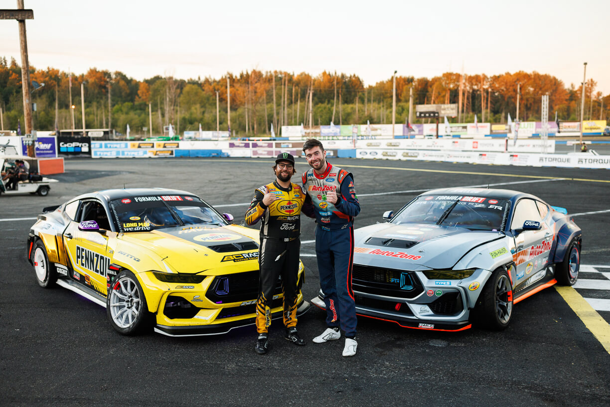 James and Chelsea smile for the camera in front of their 2024 Mustang RTR Spec 5-FD's