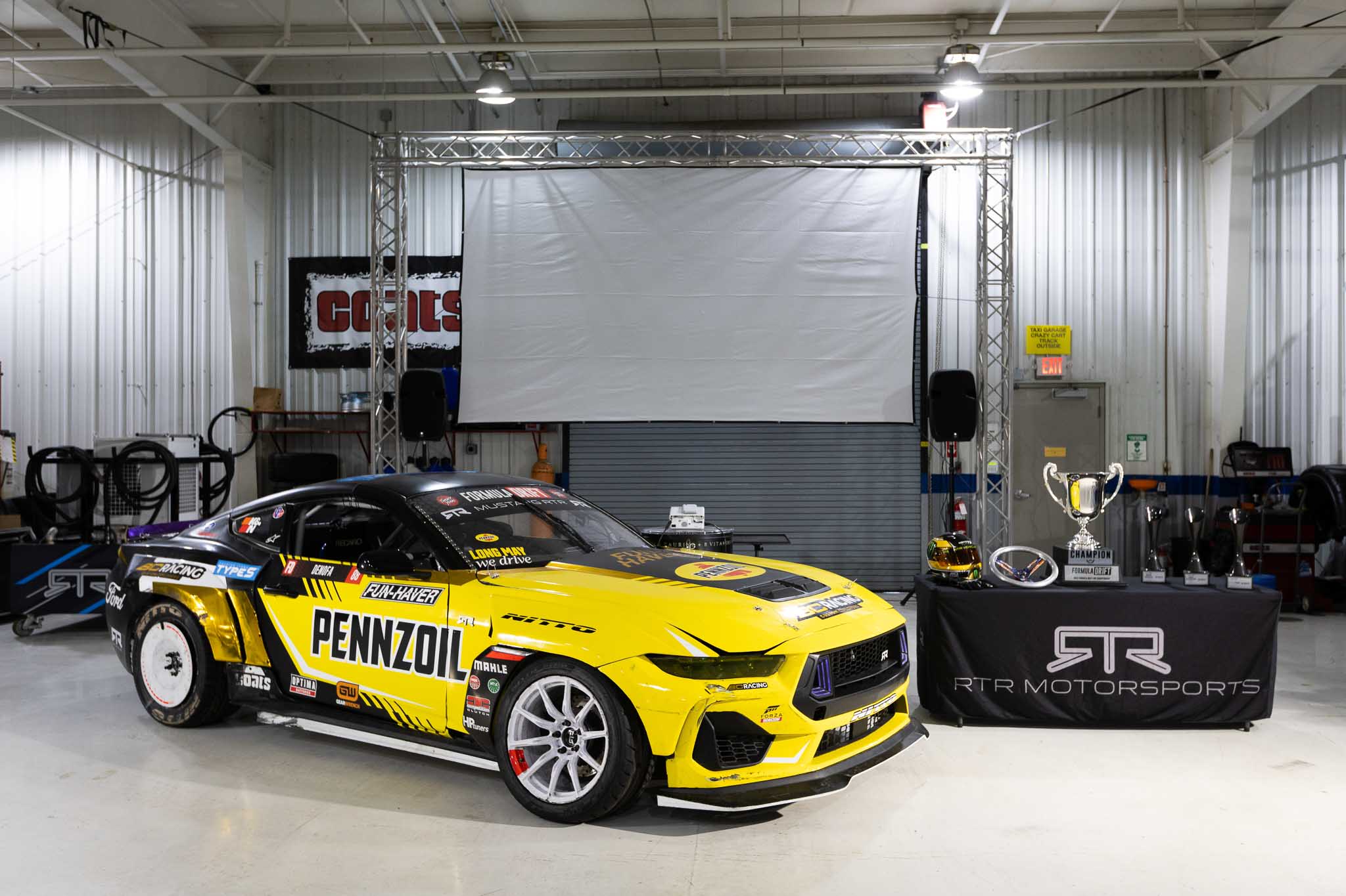 Chelsea DeNofa's Spec 5 Mustangs and all the RTR FD trophies from the 2023 season