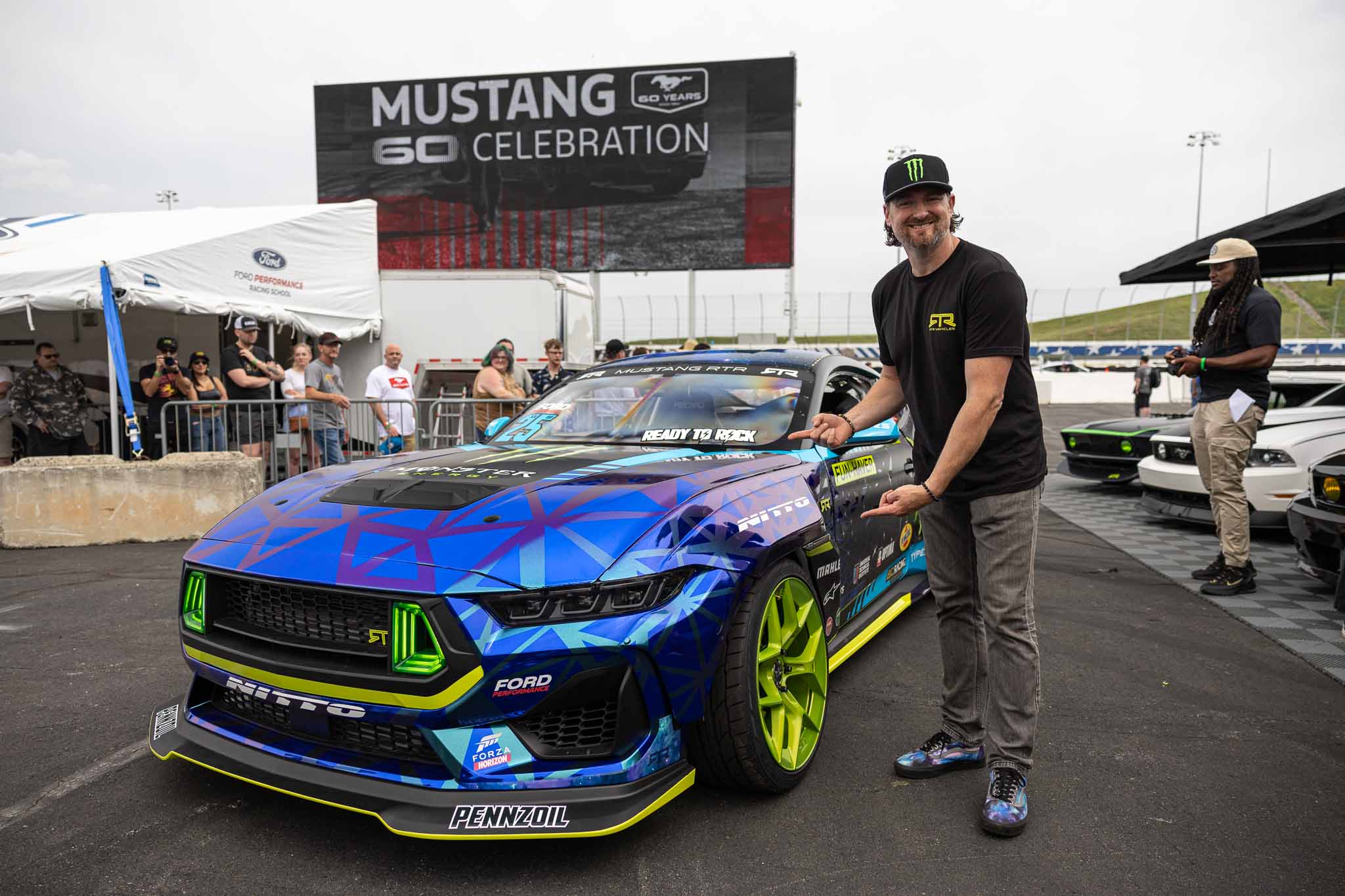 Vaughn Gittin Jr. unveils his 2024 Mustang RTR Spec 5-D's new livery at the Mustang 60th Anniversary