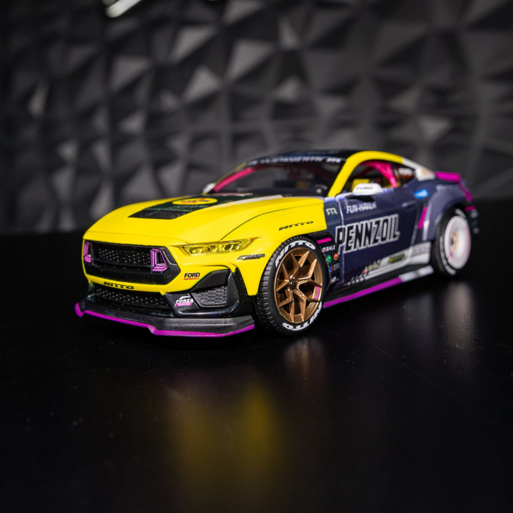 Ben Hobson's 2024 Ford Mustang RTR Spec 5-FD Diecast Model with detailed interior, rubber tires, and functional hood and doors, on display.