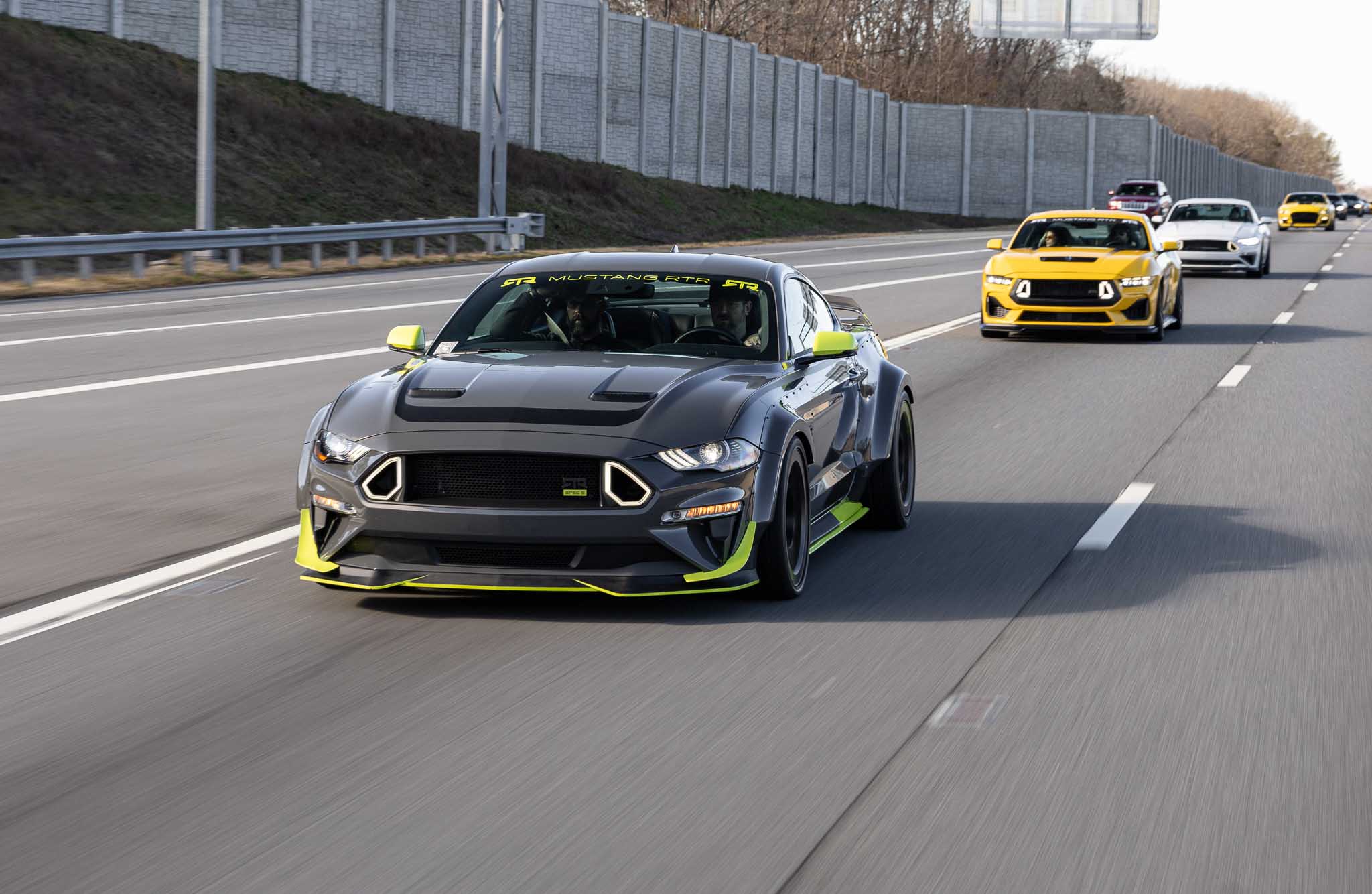 Vaughn Gittin Jr.'s 10th Anniversary Mustang RTR Spec 5 cruises down the highway