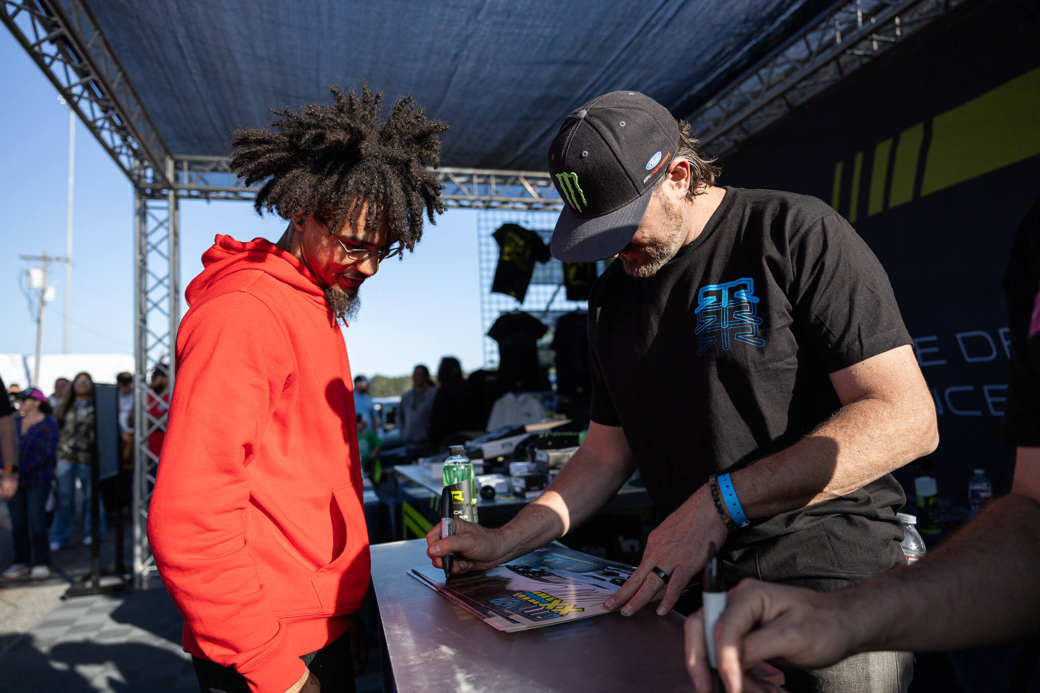 Vaughn Gittin Jr signs autographs for fans at NMRA Gainsville