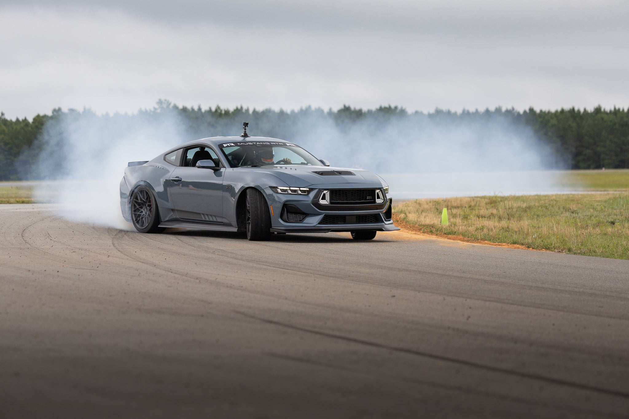 2024 Mustang RTR Spec 2 driving on a racetrack